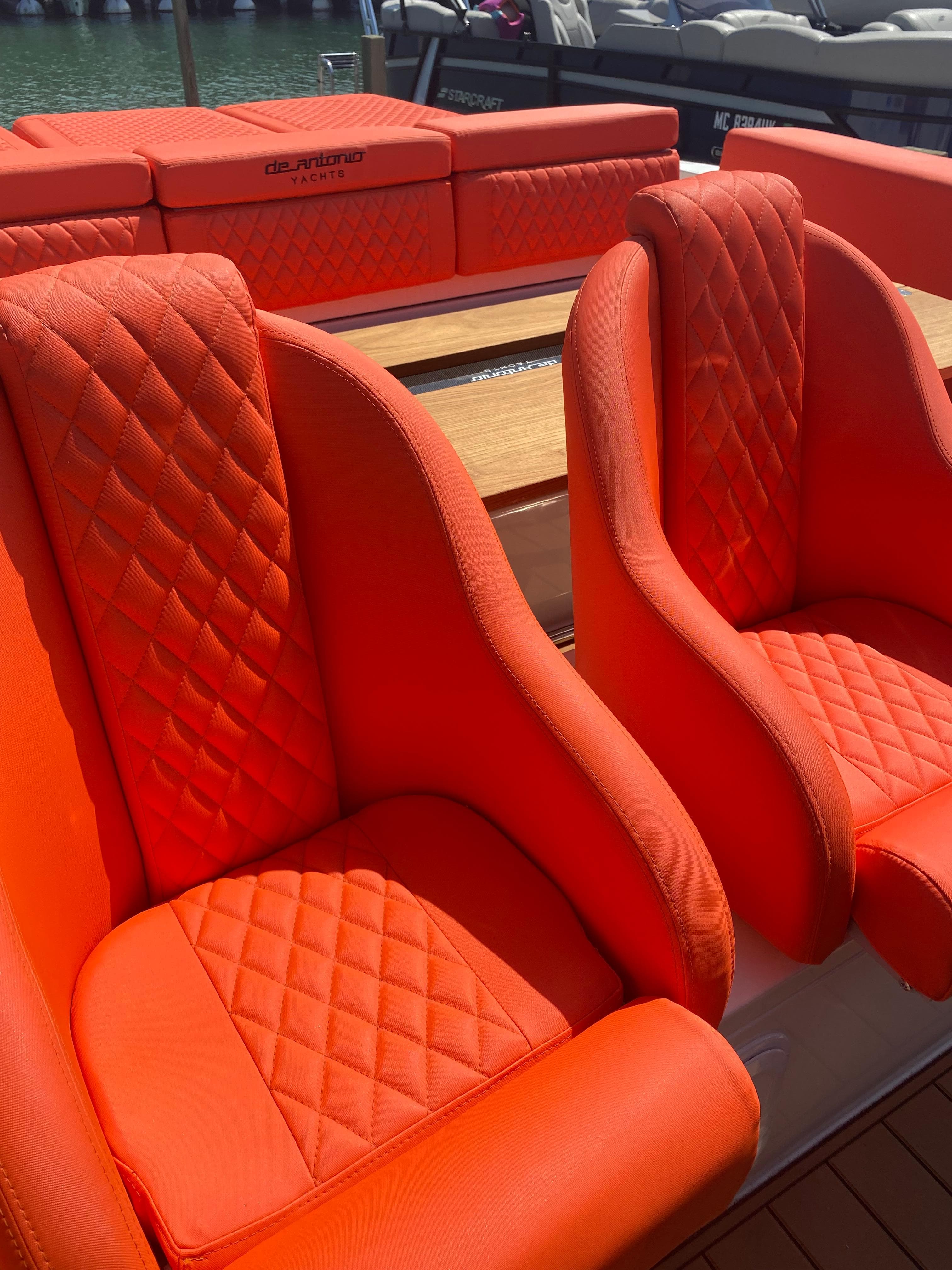 Bright orange seats on a 2020 De Antonio Yachts D 28 model.