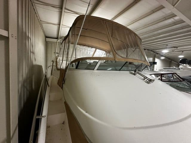 2002 Silverton 39 Motor Yacht in storage facility, side view.