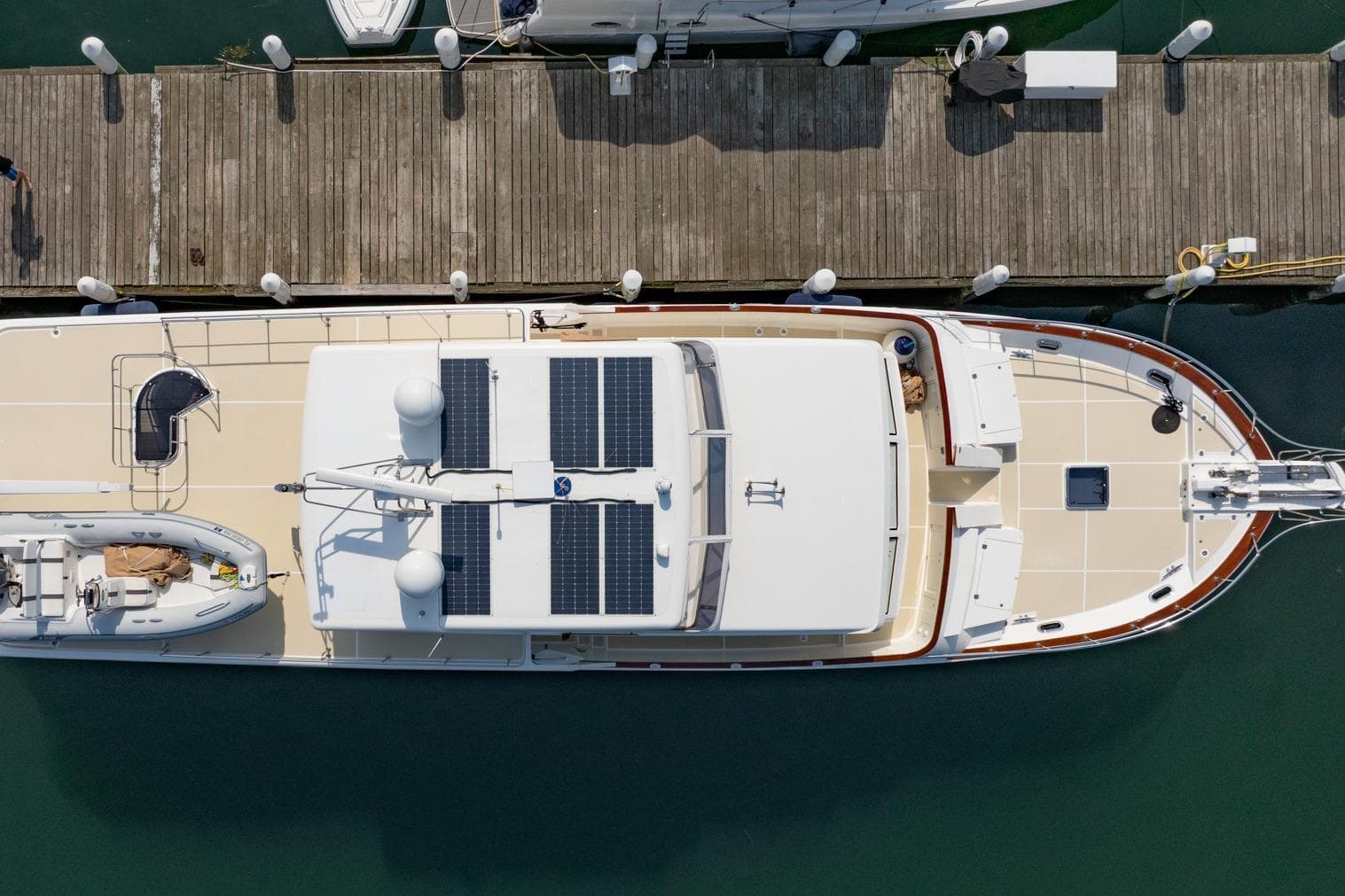 Overhead view of 2016 Grand Banks 72 Aleutian RP yacht docked at marina.