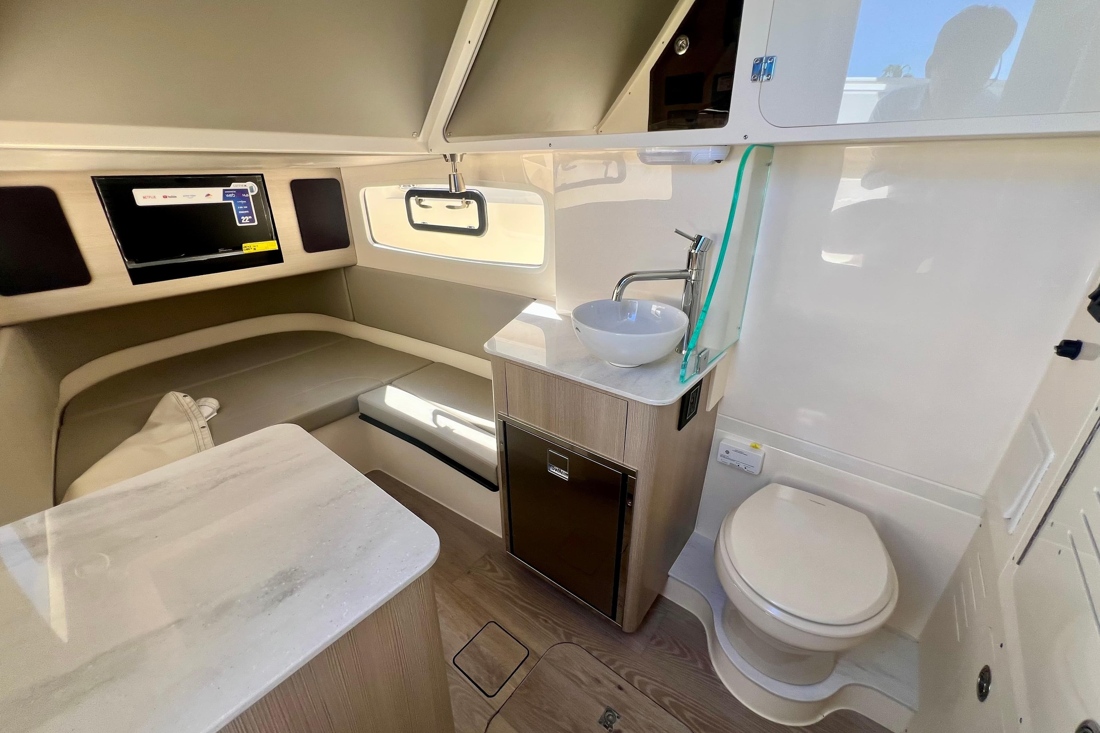 Interior of 2026 Scout 357 LXF boat with modern amenities and sleek design.