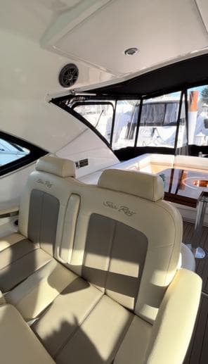 2014 Sea Ray 410 Sundancer interior with beige seating and modern design.