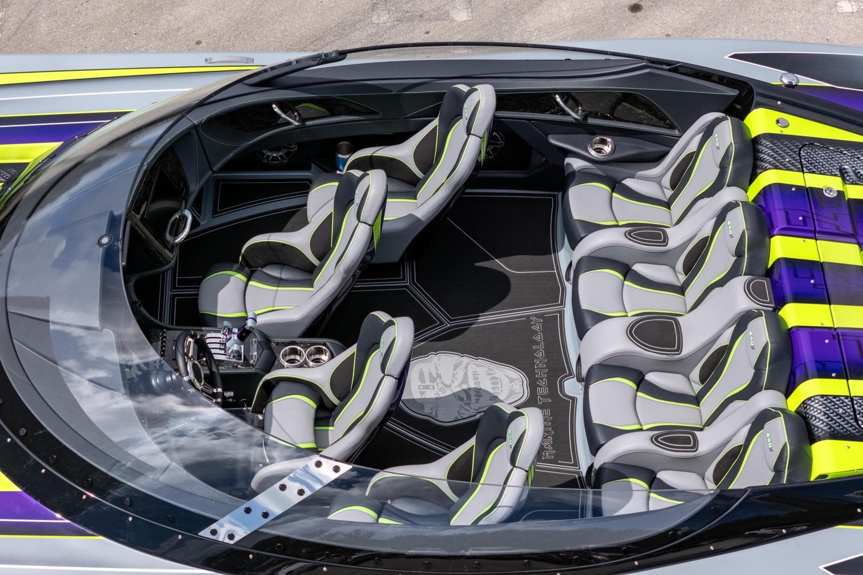 2024 MTI 440X boat interior with sleek, modern seating and vibrant accents.