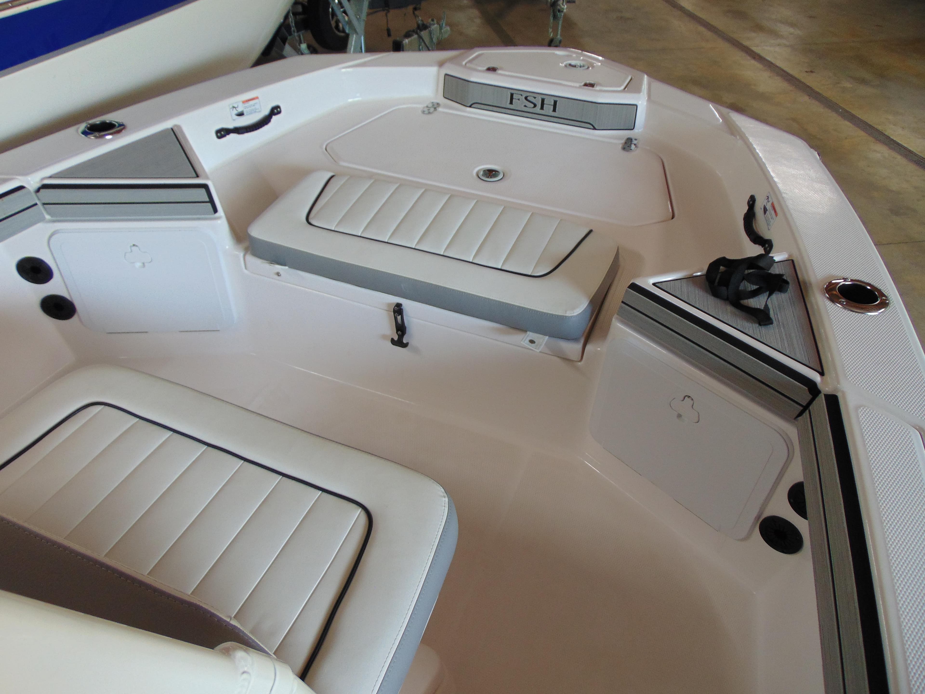 Interior of 2024 Yamaha Boats 190 FSH Sport with seating area.