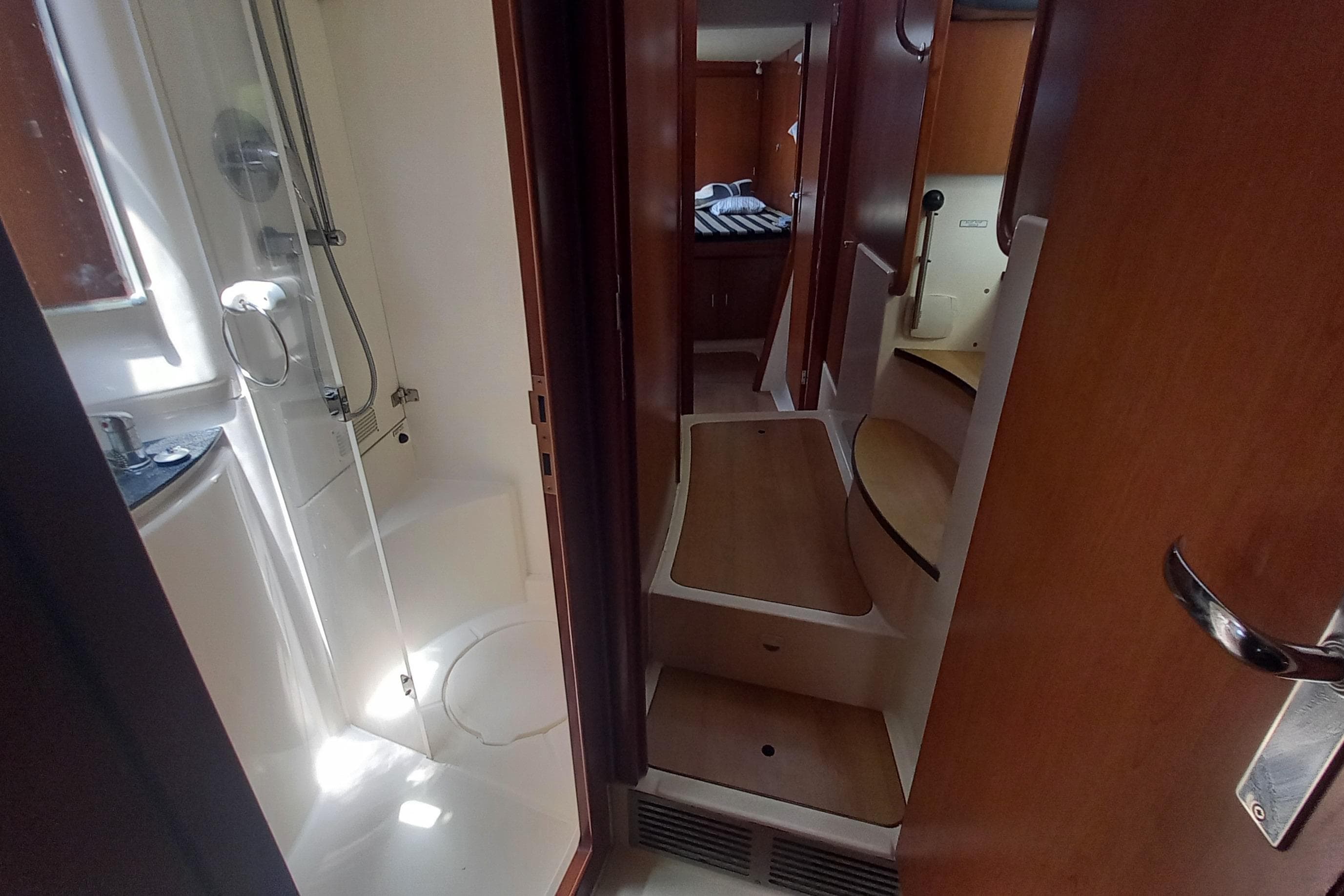 Interior of 2010 Leopard 46 yacht showing bathroom and cabin area.