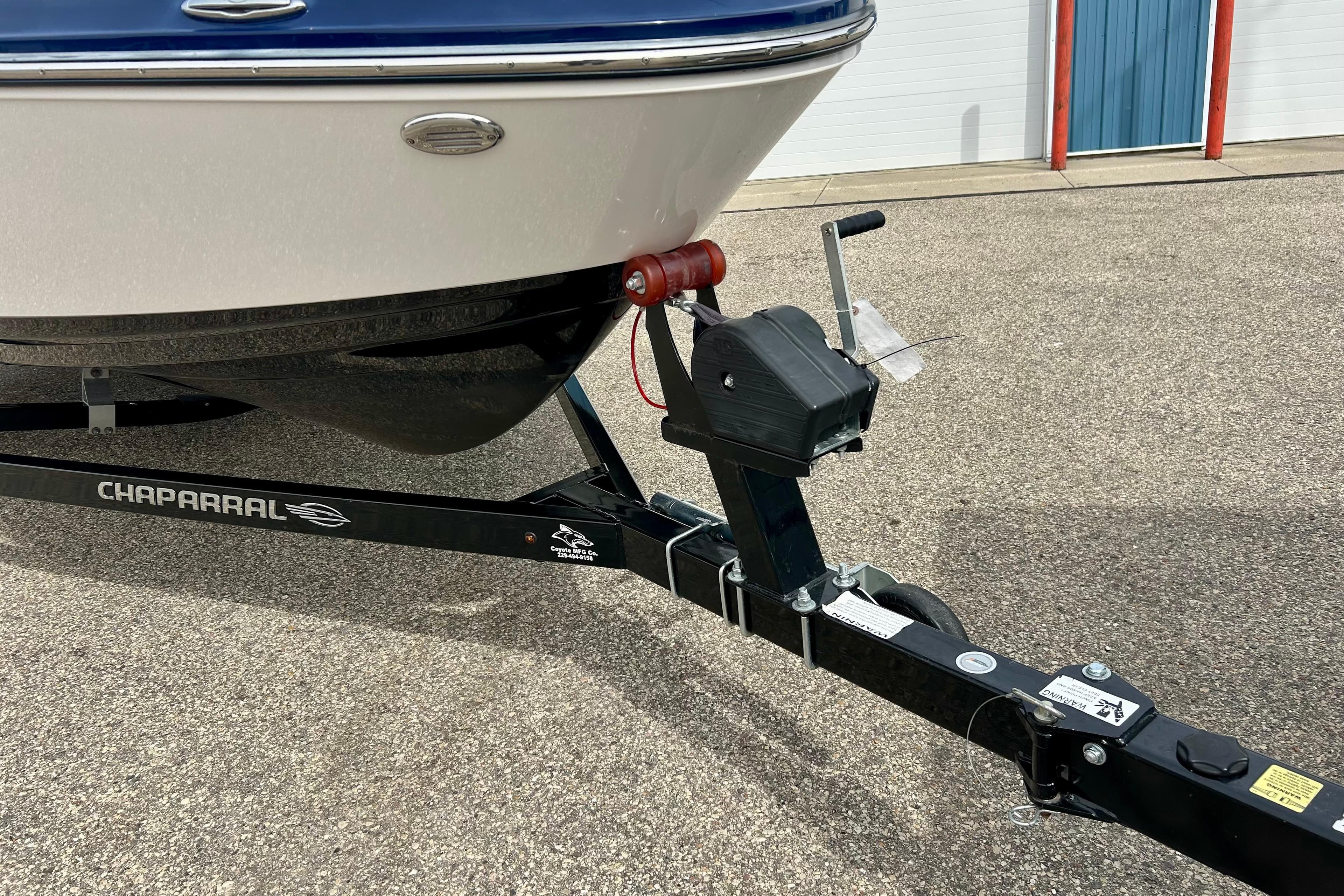 2017 Chaparral 203 Vortex boat on trailer, close-up of hitch and front hull.
