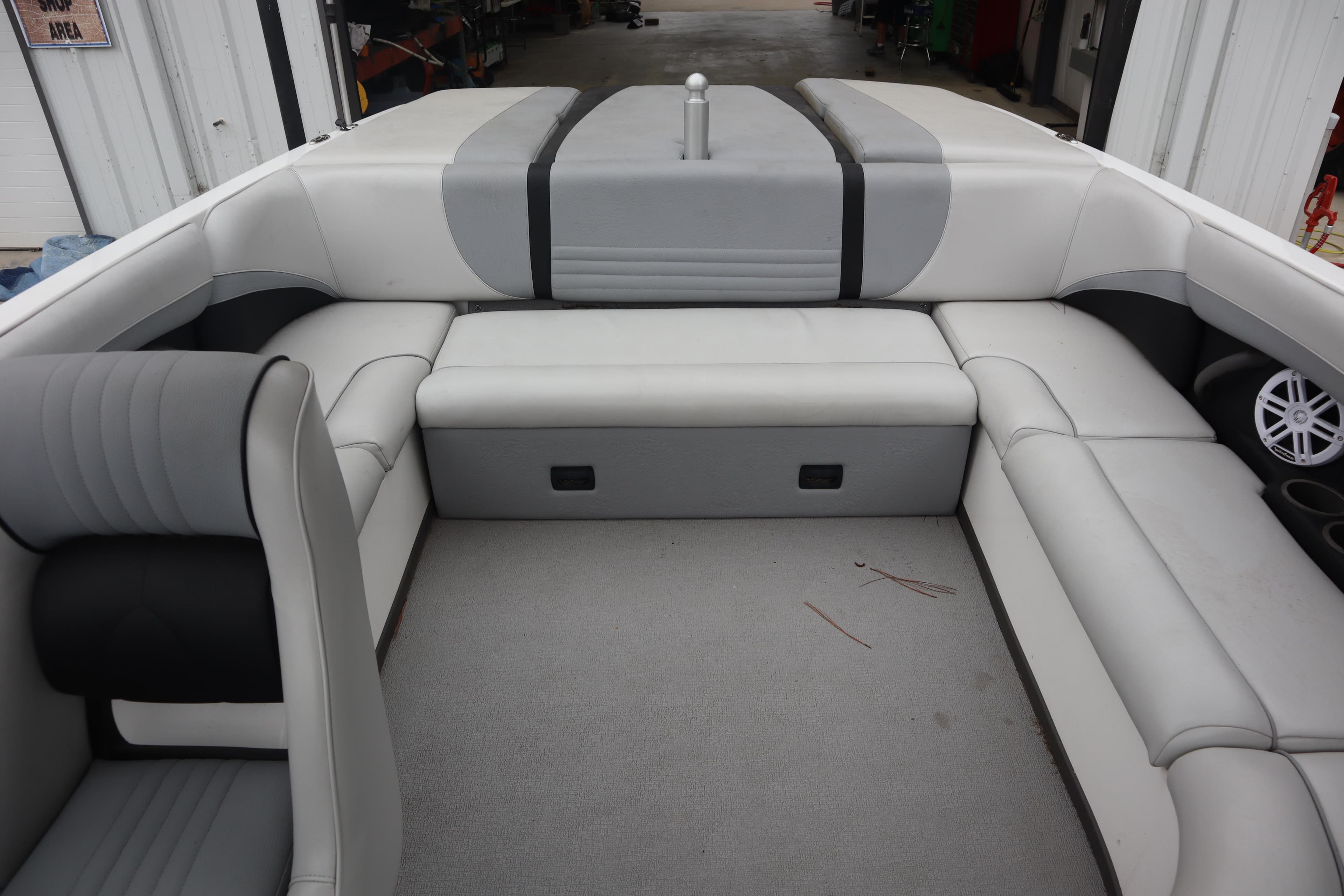 2006 Moomba Outback LSV boat interior with gray and black seating arrangement.