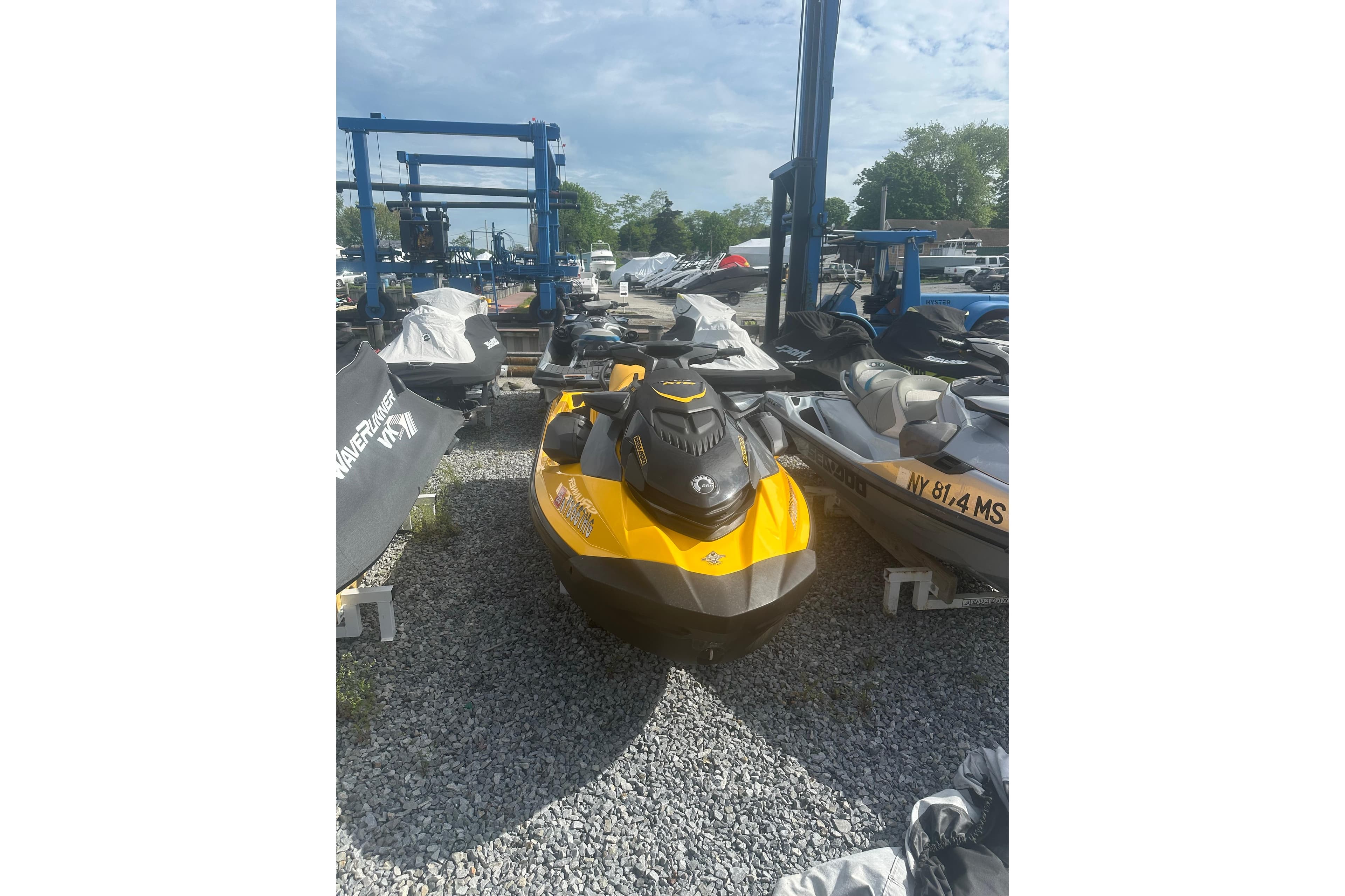 2022 Sea-Doo GTR 230 jet ski in a storage yard, surrounded by other watercraft.