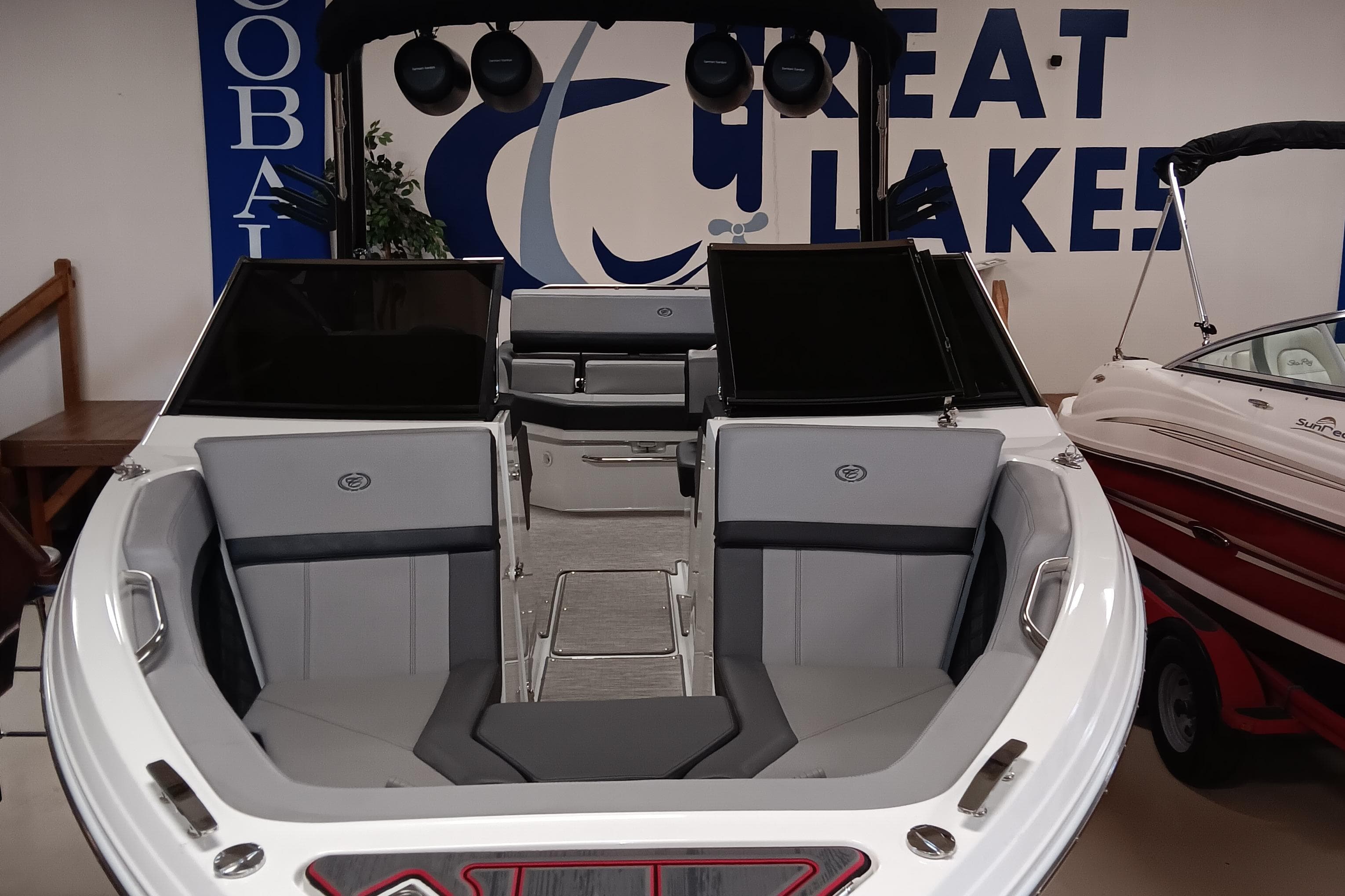 2023 Cobalt R4 boat interior at Great Lakes showroom, featuring sleek seating and modern design.