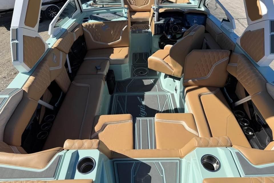 2026 Tigé 22RZX boat interior with tan leather seating and modern design.