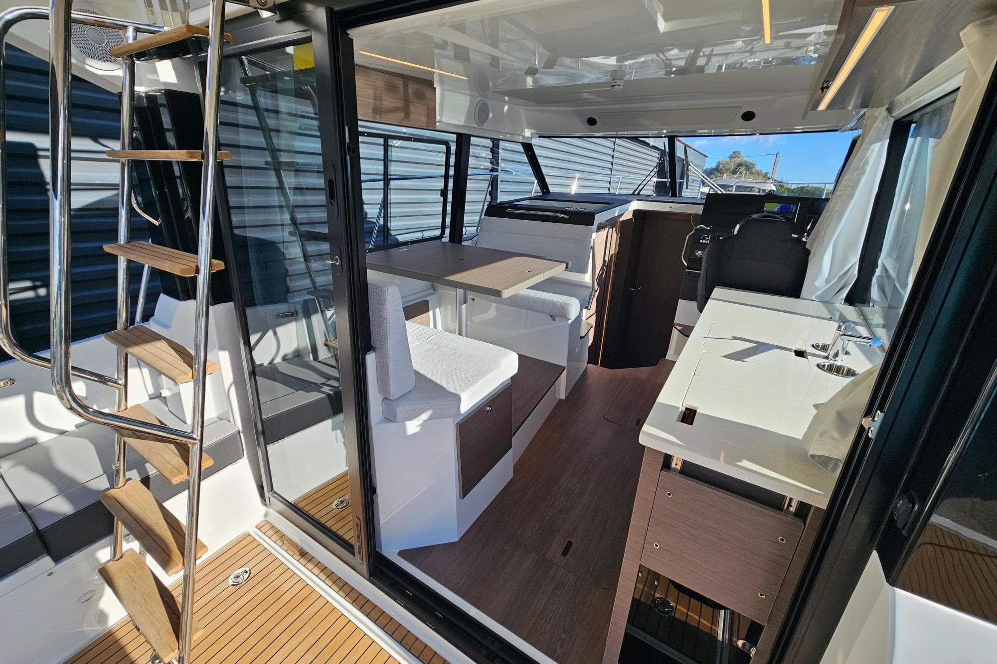 Interior of 2026 Jeanneau Merry Fisher 1095 Fly Serie 2, featuring modern design and amenities.