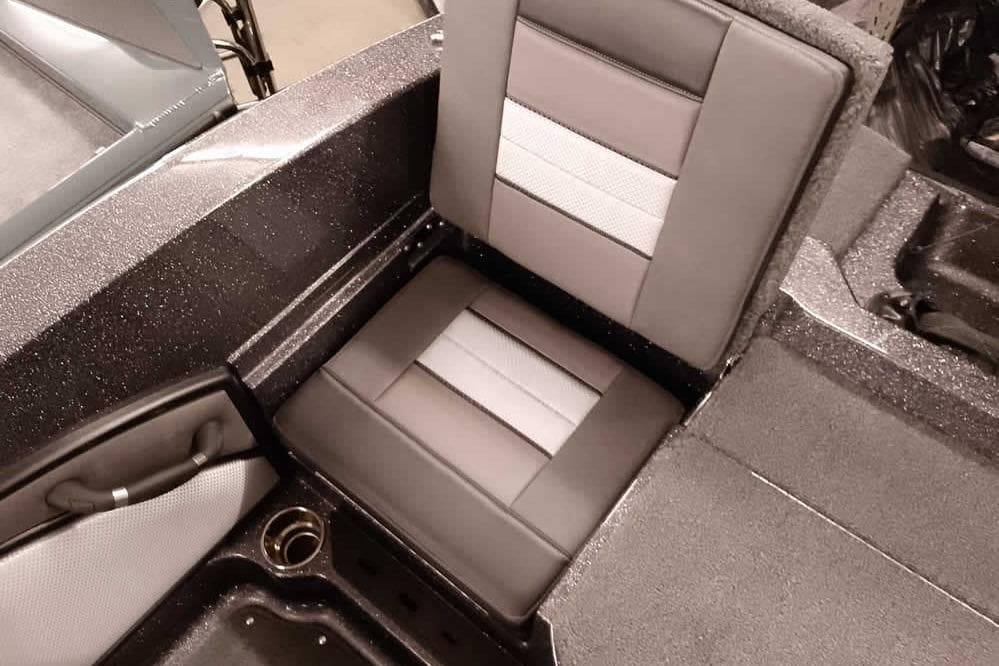 2026 Ranger 2050MS Reata boat seat with sleek, modern design and cup holder.
