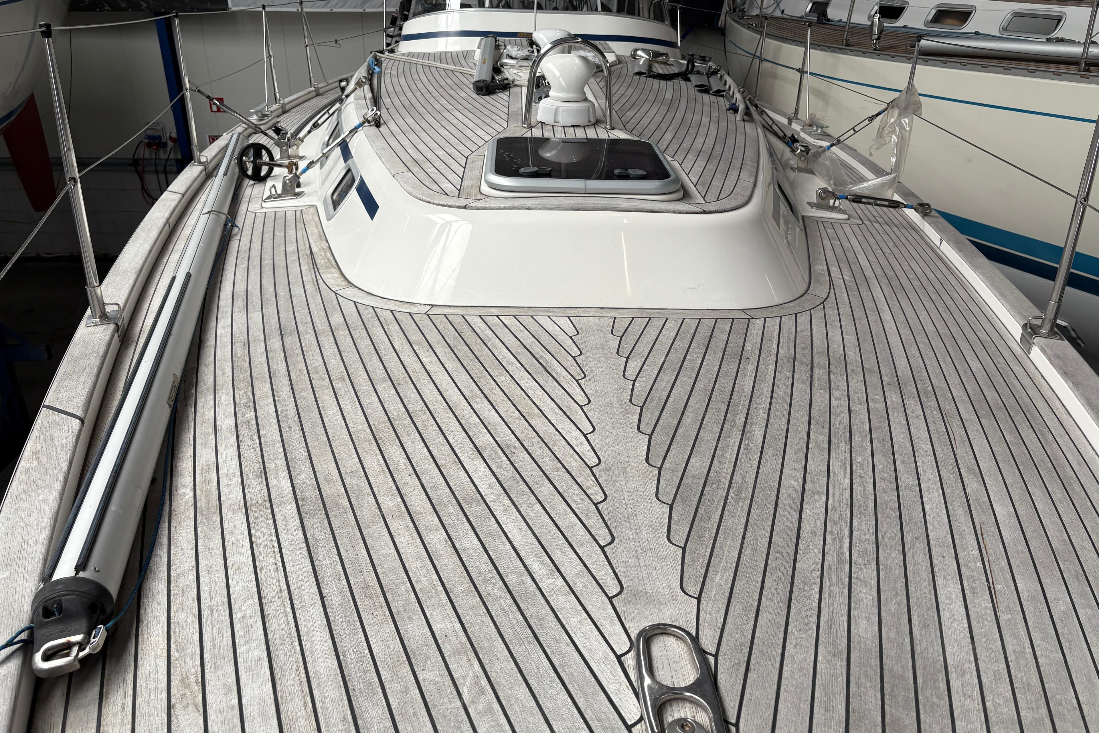 Deck of 2008 Malo 37 Classic yacht with sleek wooden finish and modern fittings.