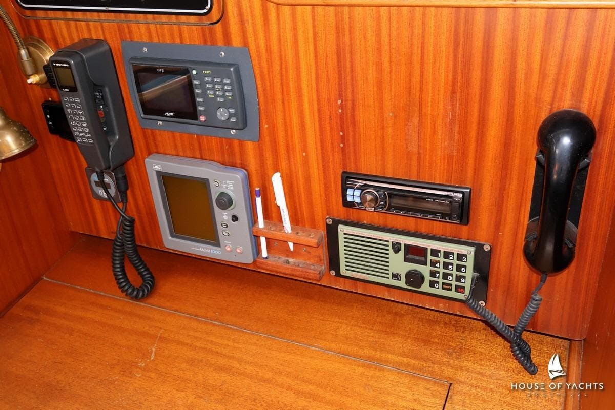 Control panel with communication devices on a 1991 Banner 41 yacht.