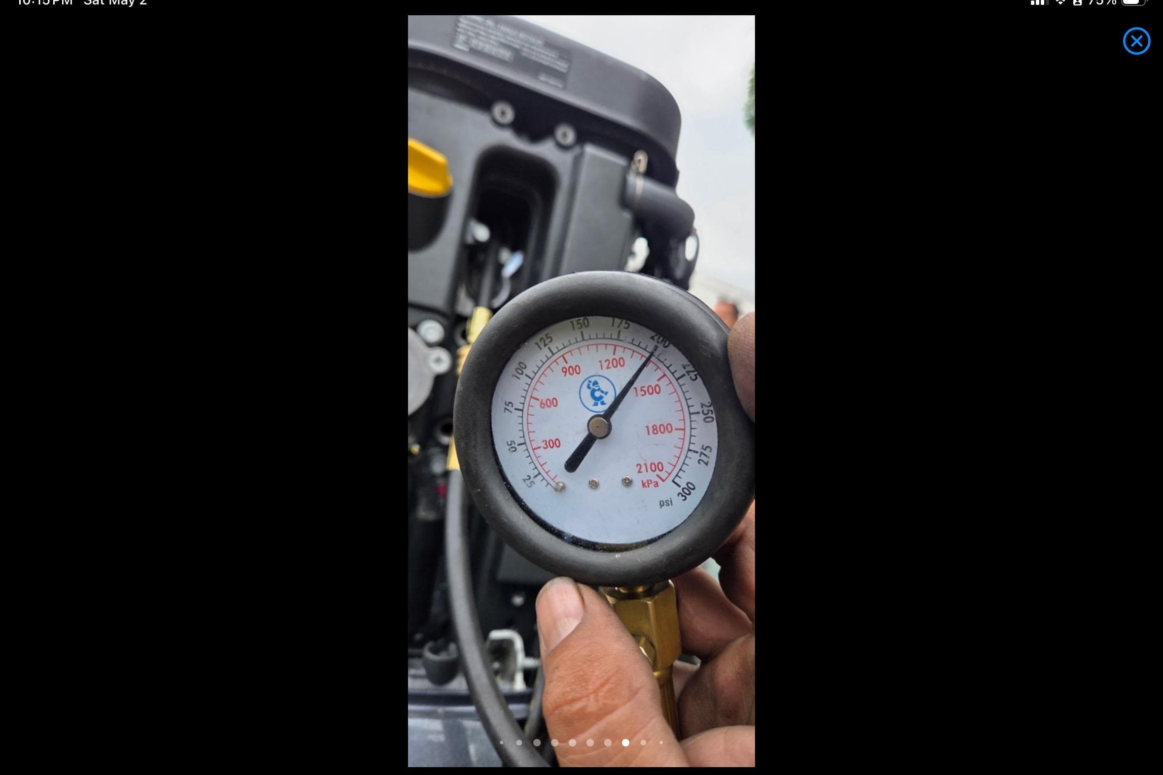 Close-up of a pressure gauge reading 1500 psi on Xpress H18, 2014 model.