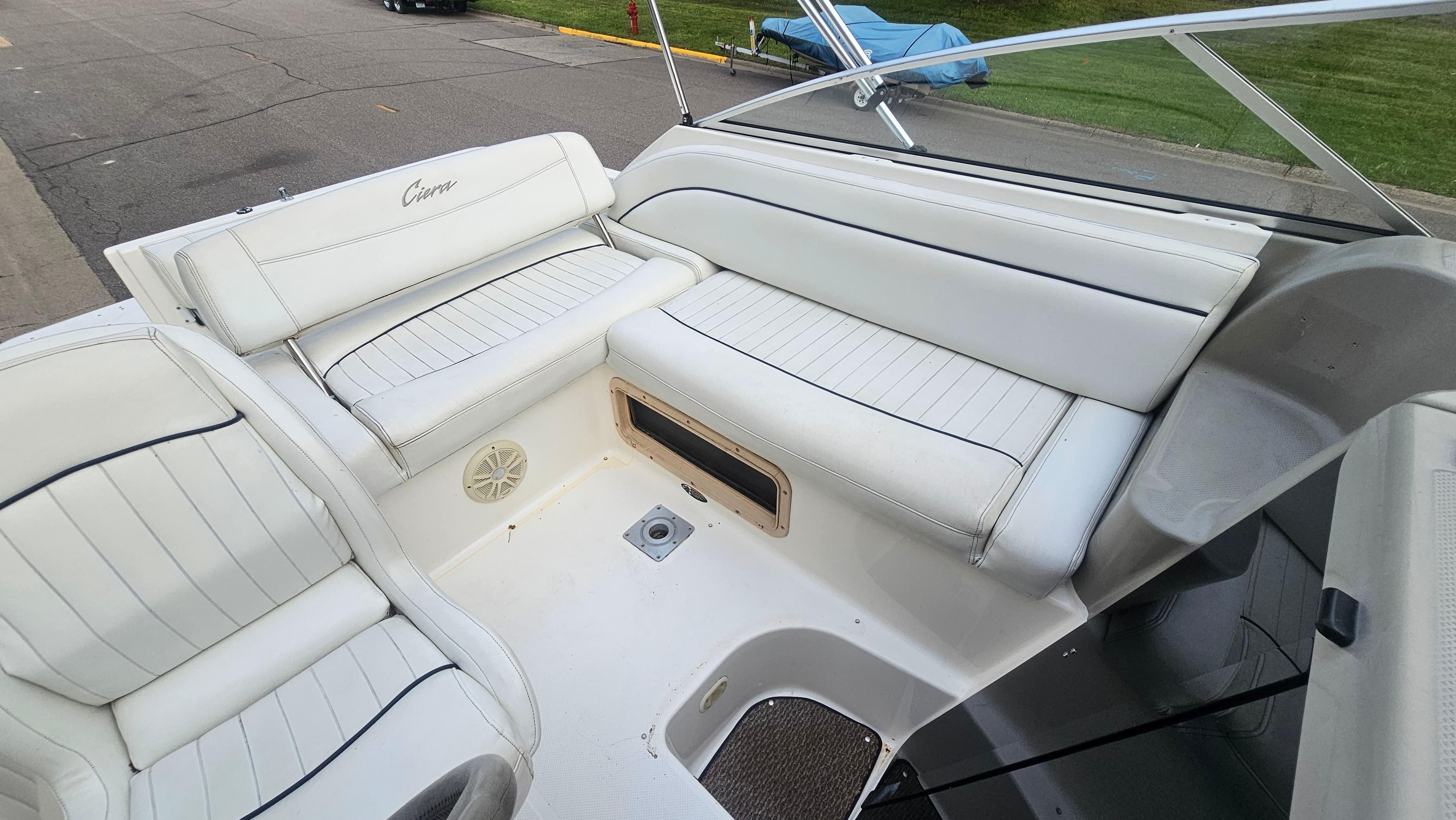 1998 Bayliner 2655 Ciera boat interior with white seating and sleek design.