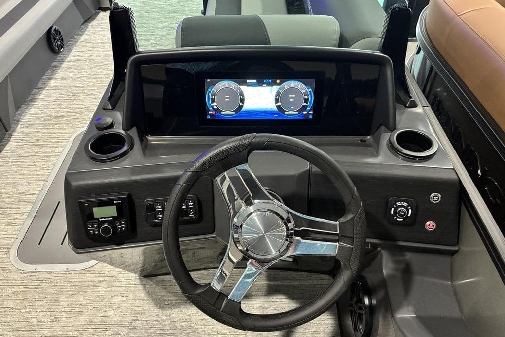 2026 Bennington S Swingback 23 SSB dashboard with modern steering and digital display.
