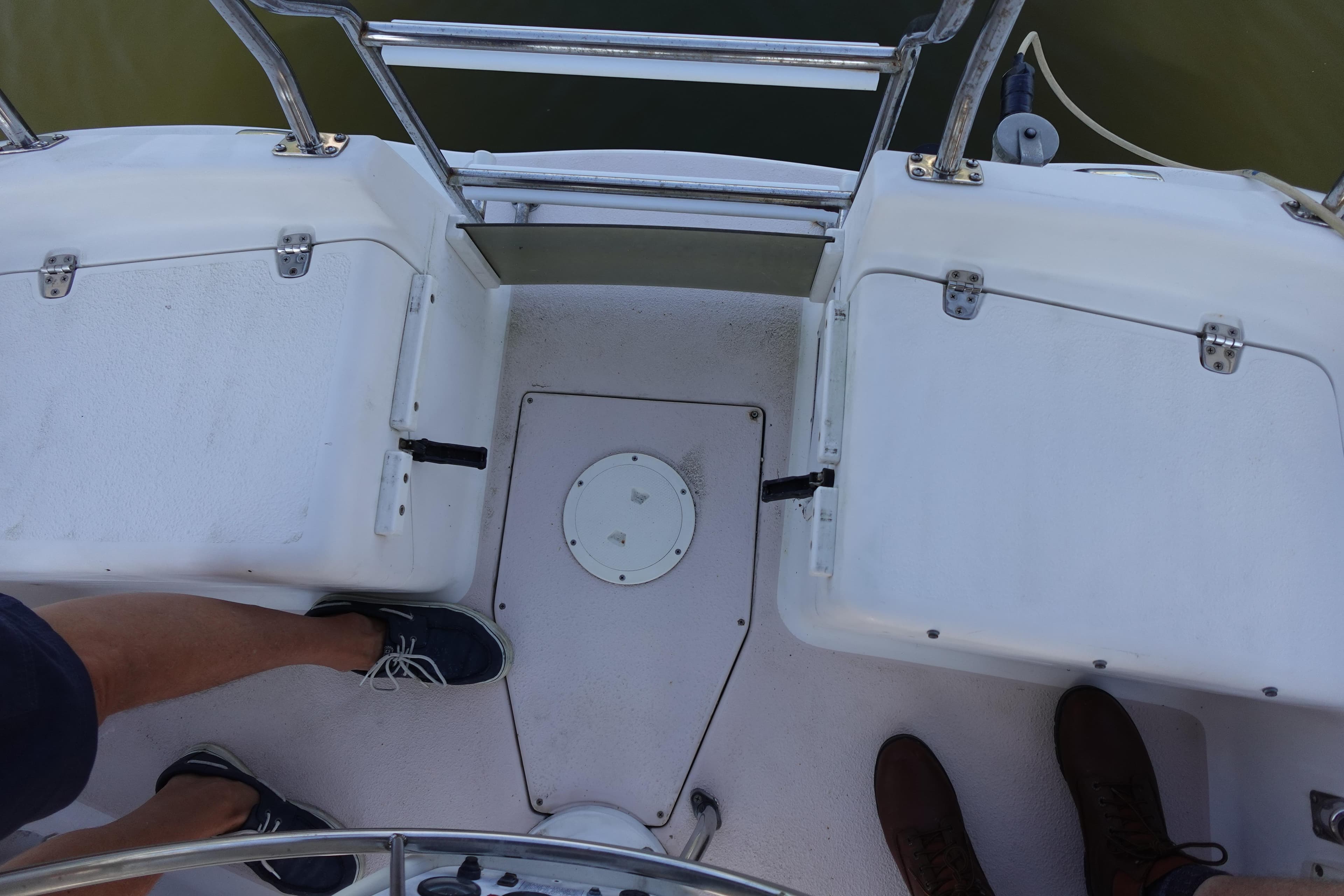 Cockpit view of a 1997 Catalina 28 sailboat with visible seating and railing.