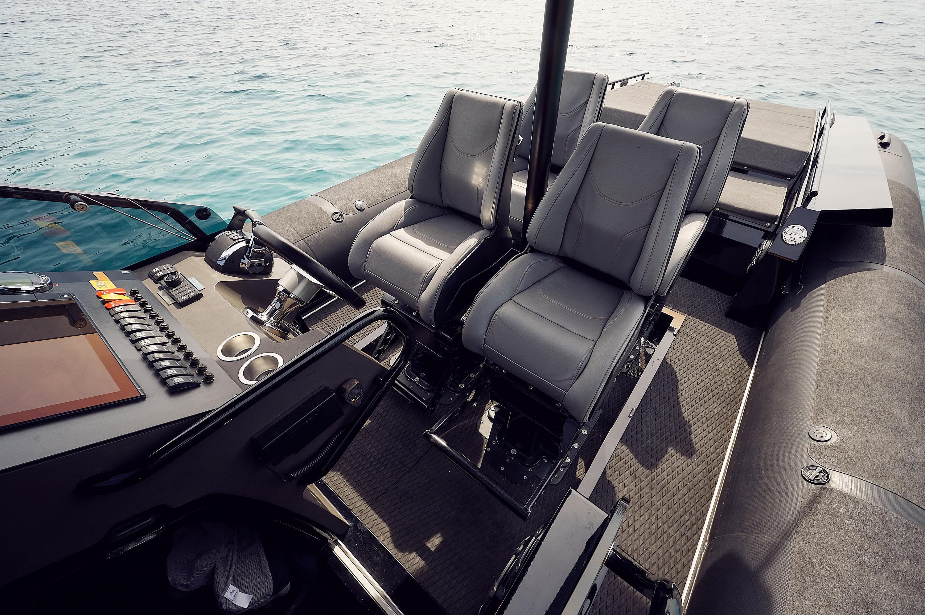 Interior of 2016 Goldfish 38 Supersport boat with modern seating and control panel.