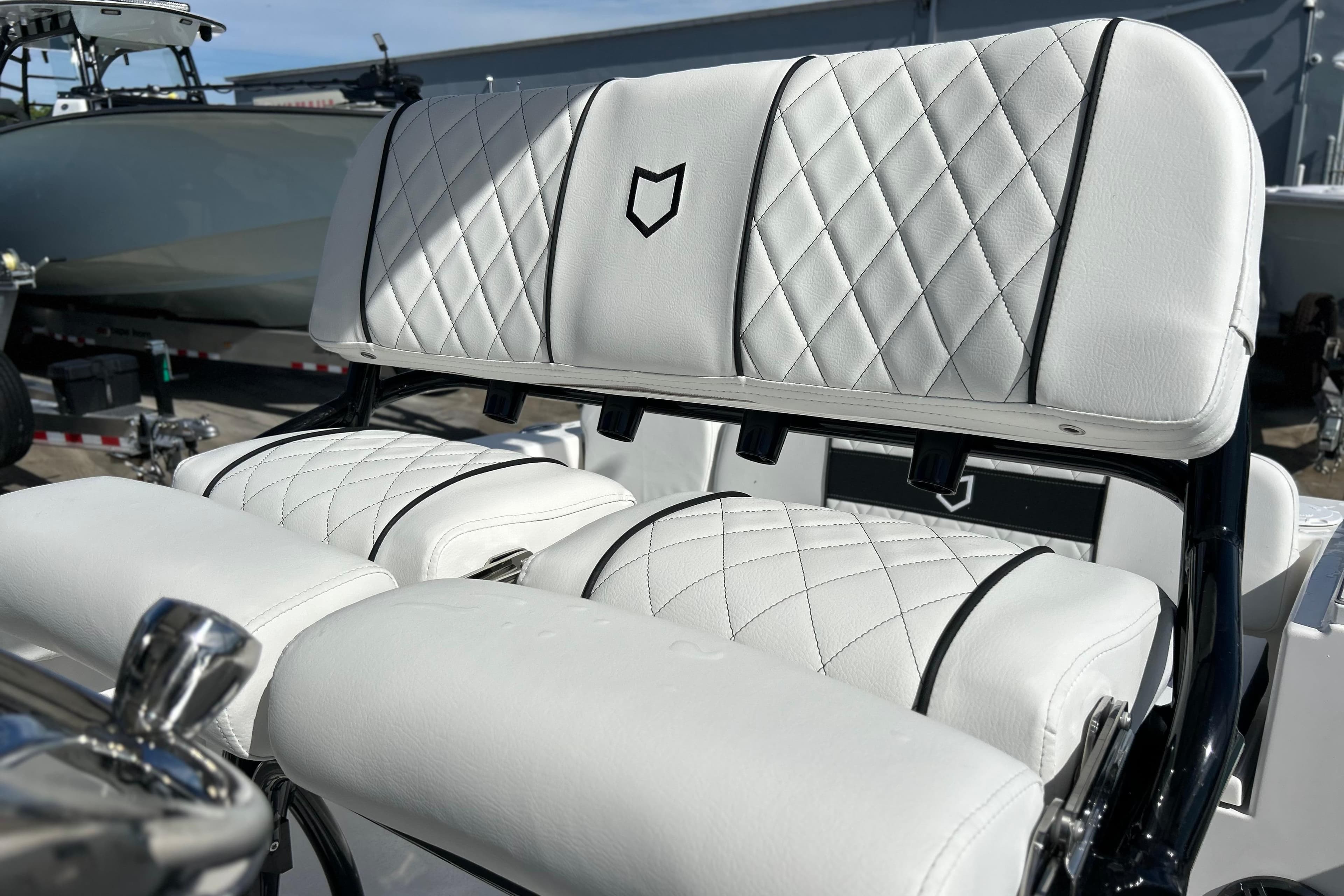 Luxurious seating on 2026 Sea Fox 228 Commander boat with diamond-stitched upholstery.