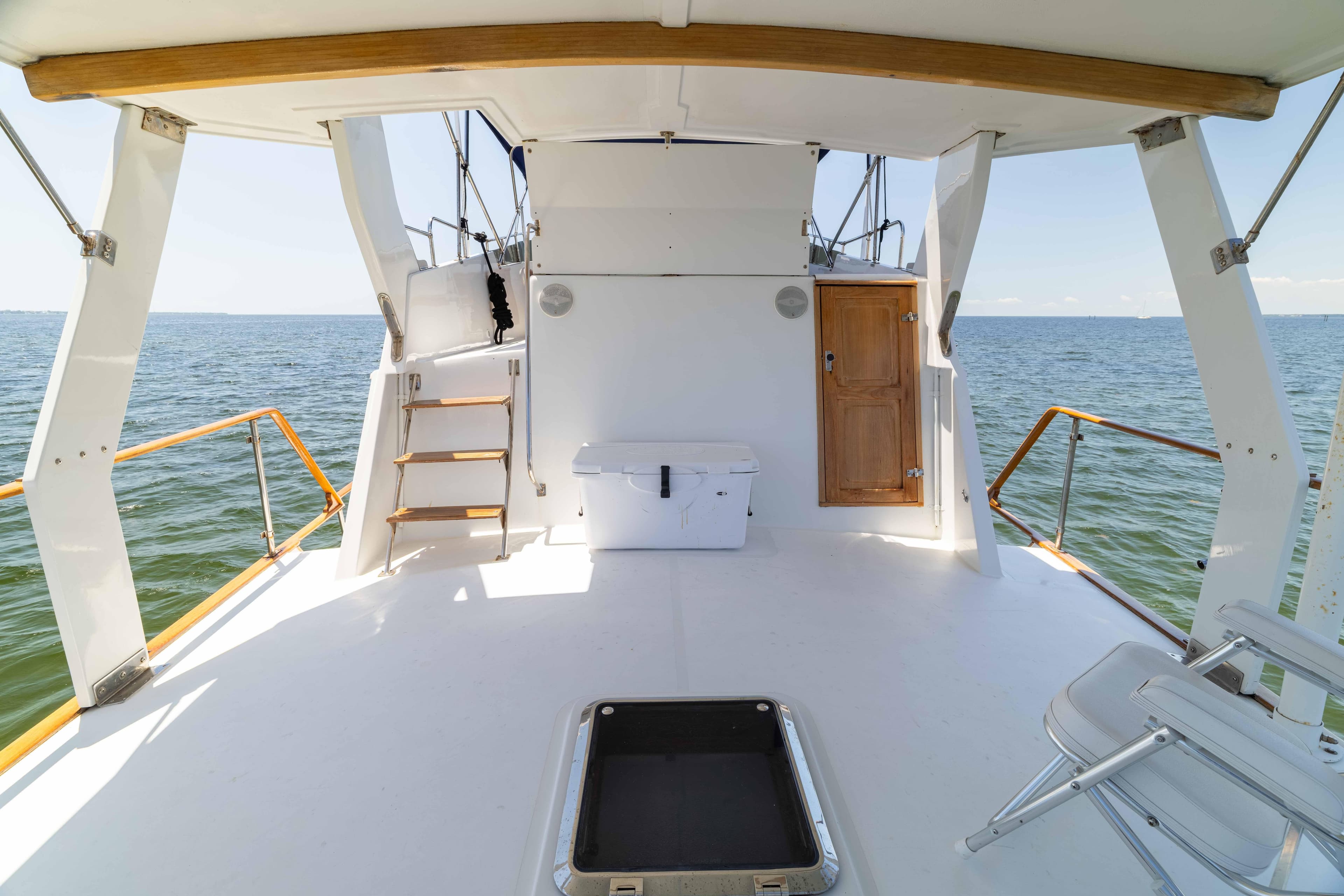 1983 Sea Ranger 45 Sundeck yacht with spacious deck overlooking the ocean.