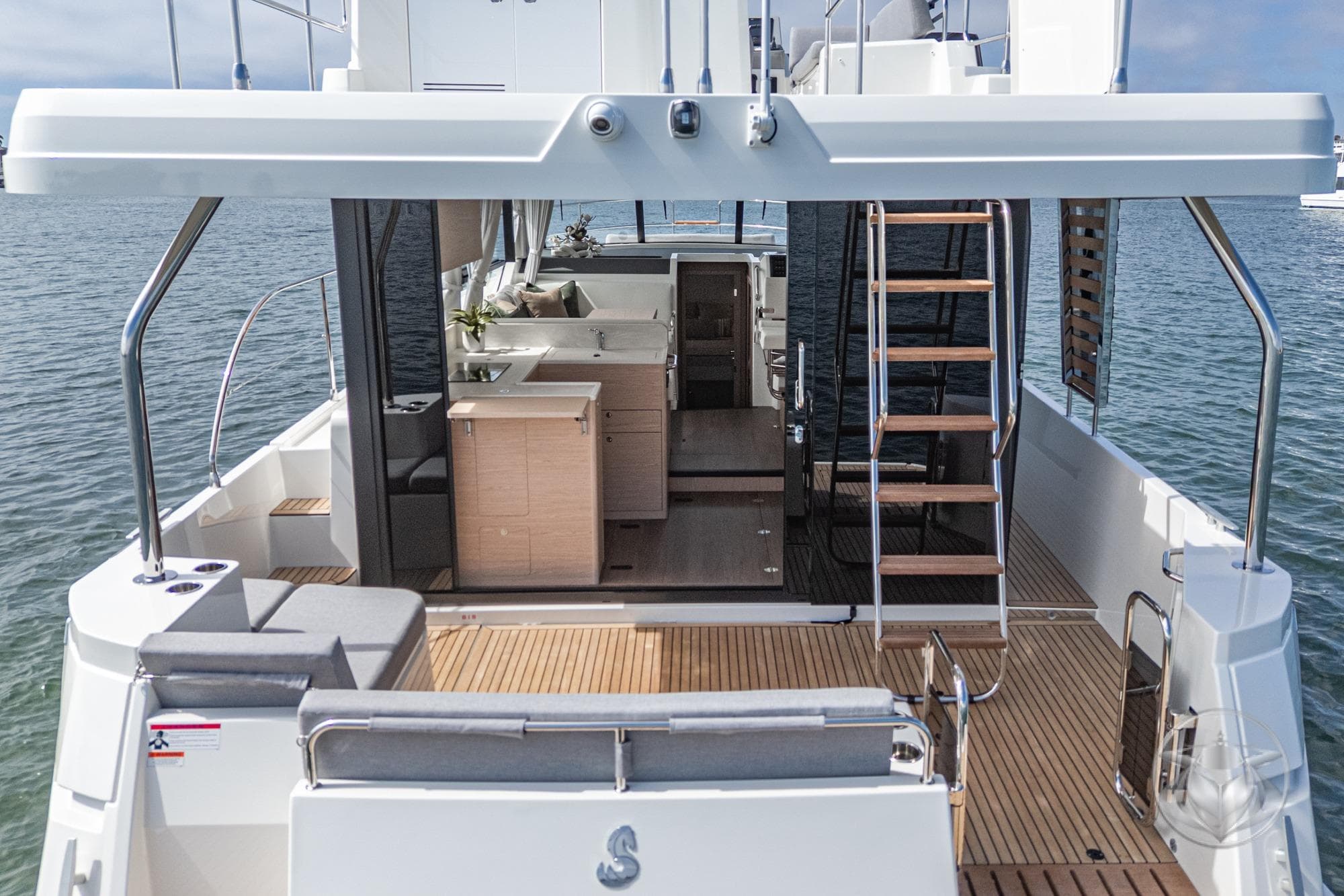 2026 Beneteau Swift Trawler 41 Fly, spacious deck and modern interior on the water.