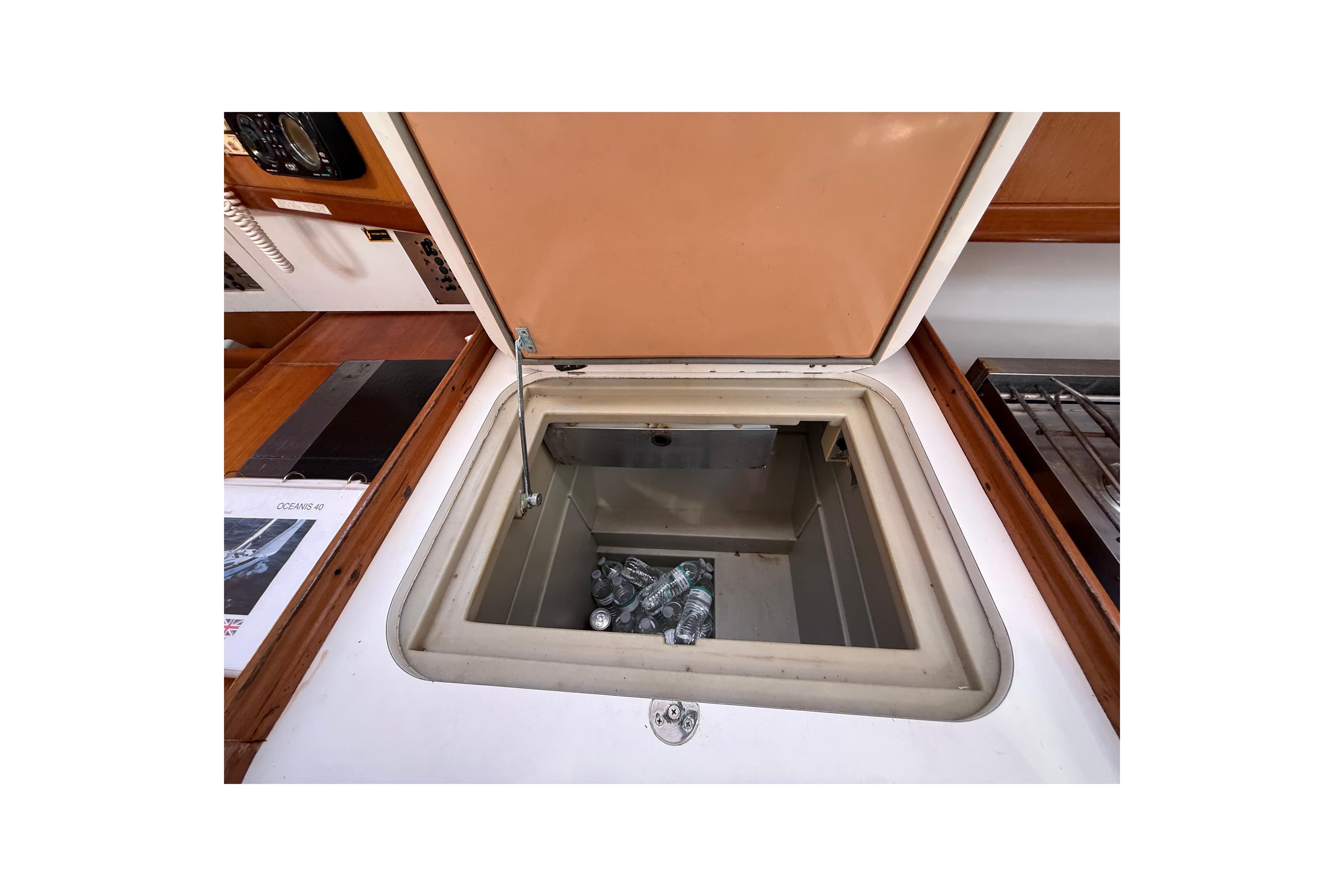 Open storage compartment in 2009 Beneteau Oceanis 40 yacht interior.