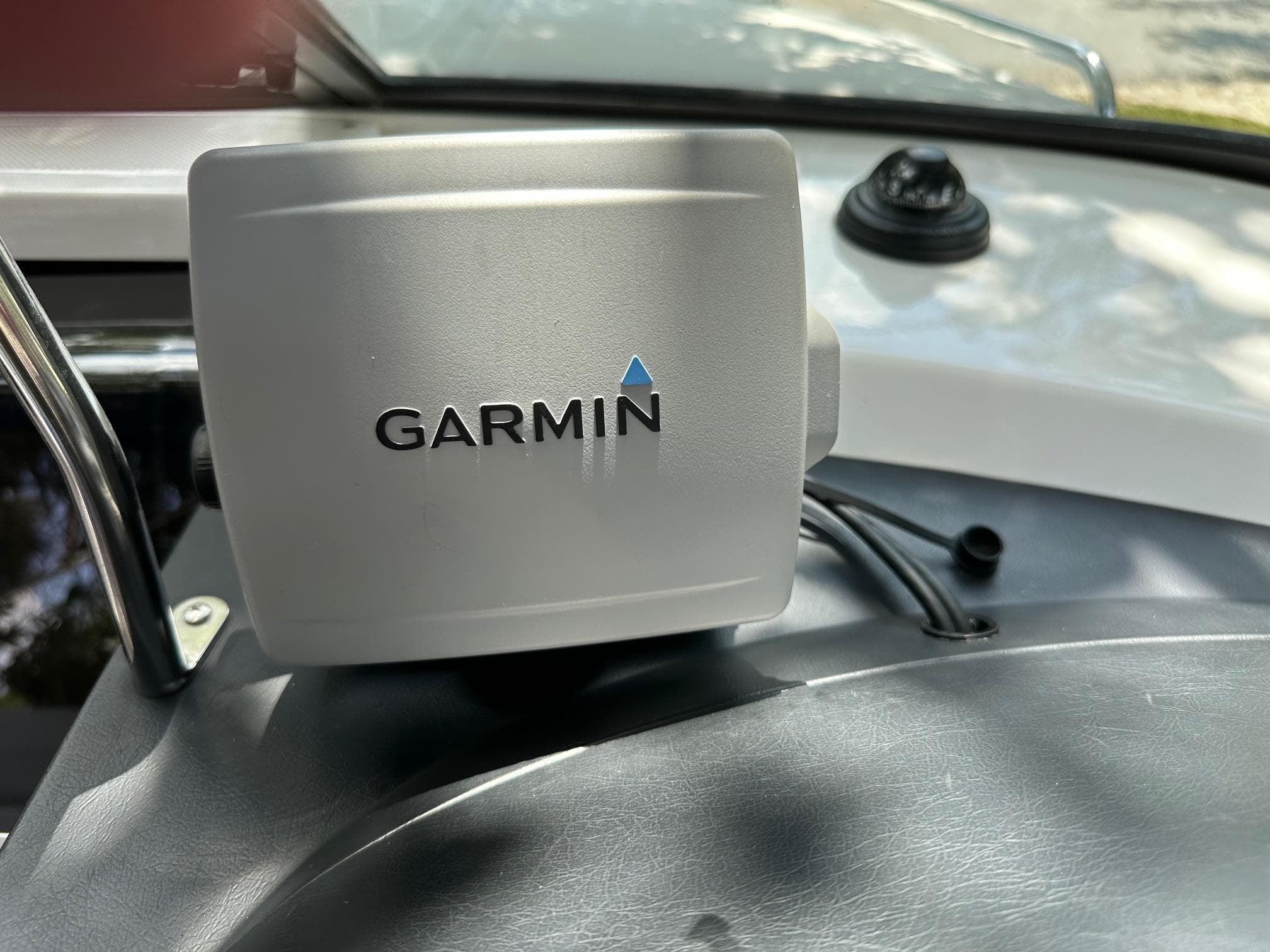 Garmin device on 2008 Regal 2250 Cuddy dashboard, close-up view.
