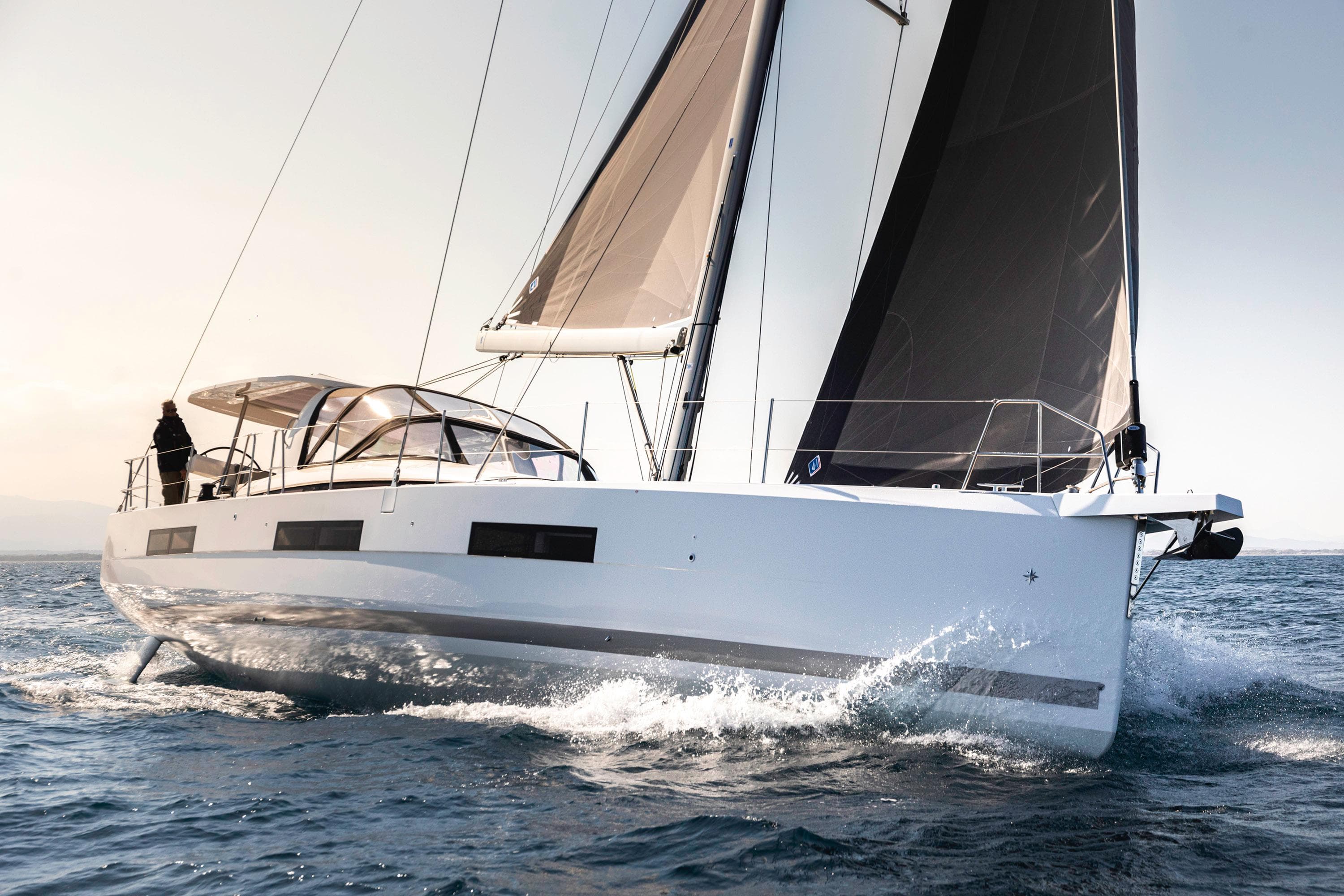 2026 Jeanneau Yachts 60 sailing on open water, showcasing sleek design and performance.