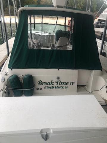 1997 Regal 292 Commodore boat docked, named Break Time IV from Flowery Branch, GA.