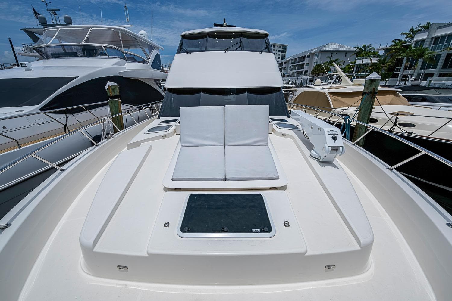 2025 Maritimo M75 yacht with sleek deck design, docked at marina.