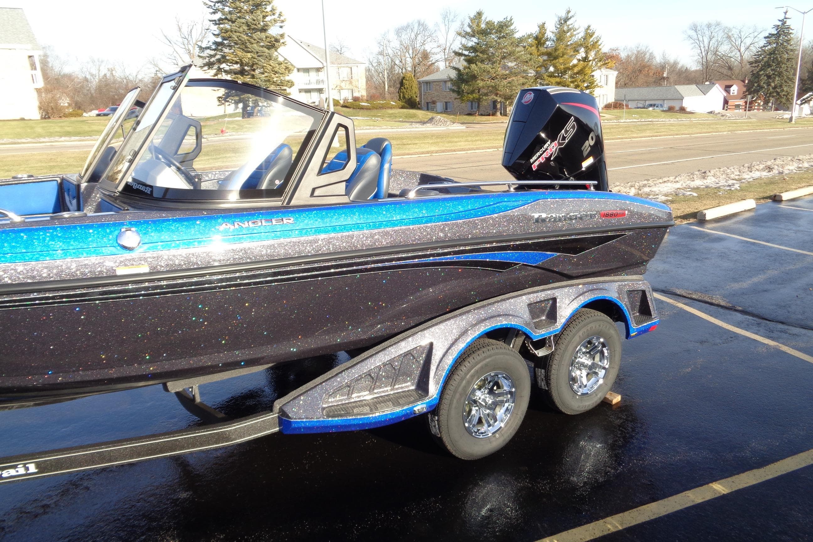 2026 Ranger 1880MS Angler boat with sleek design and vibrant blue accents.