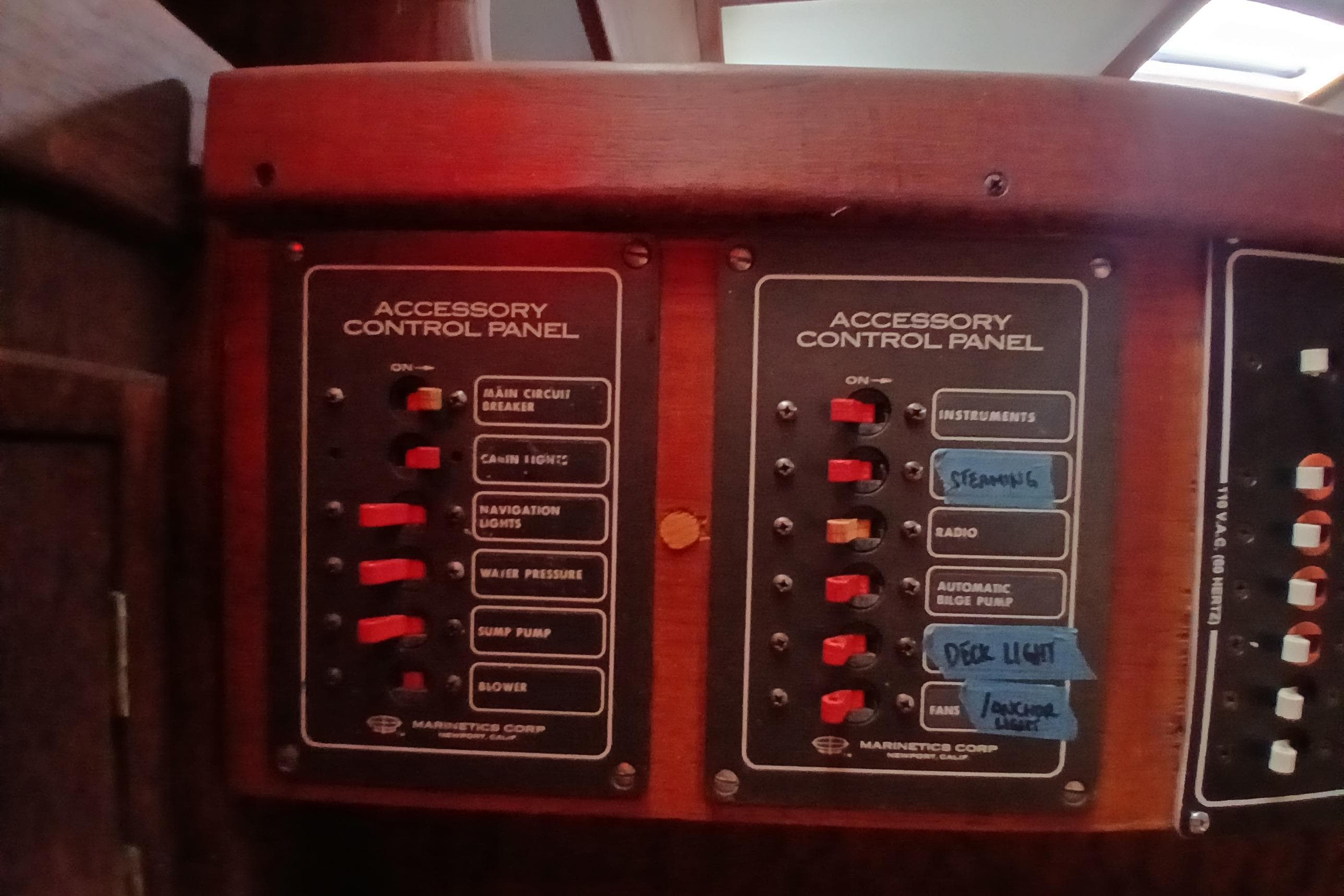 1977 Tartan 37 accessory control panel with labeled switches and circuit breakers.
