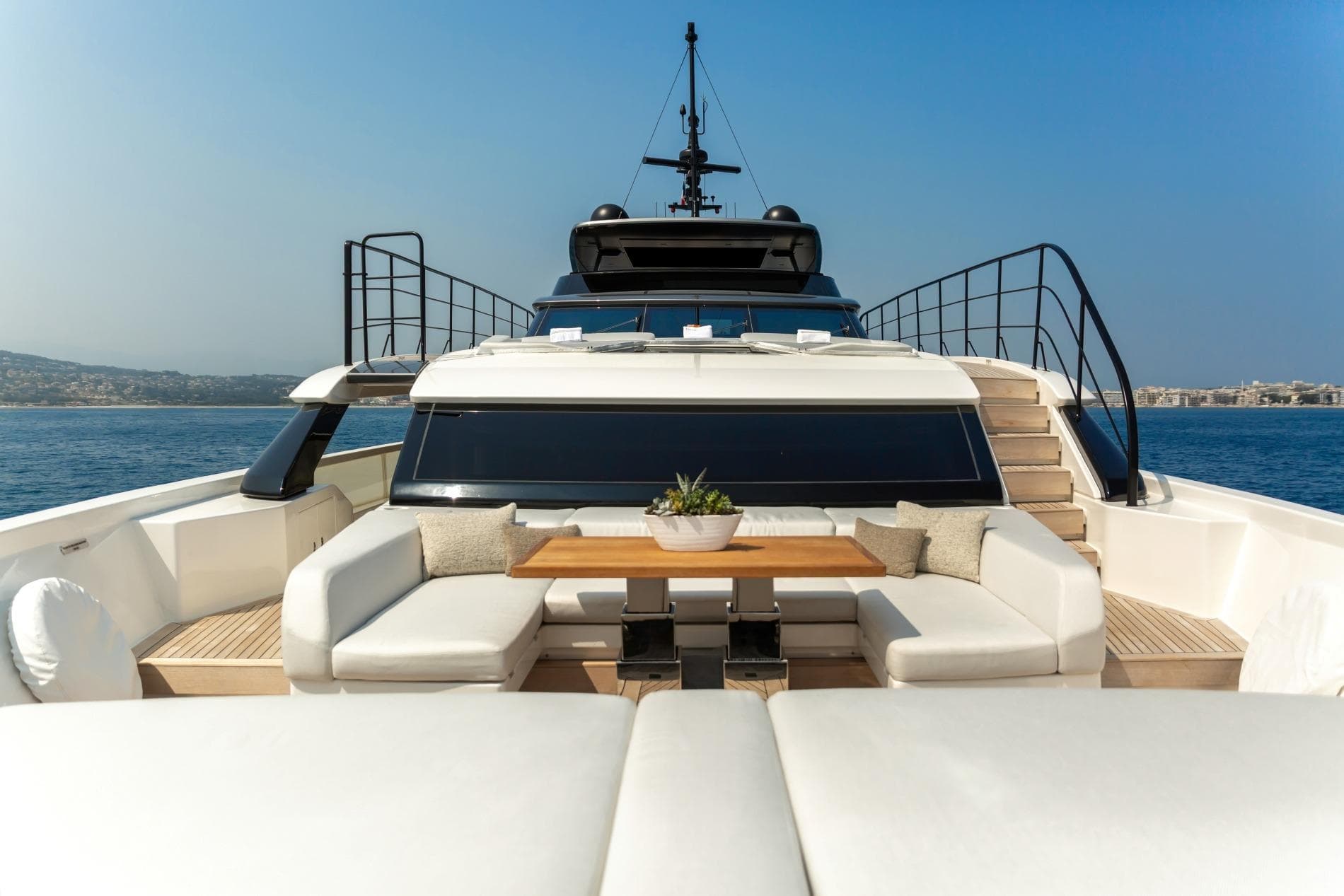 Luxurious 2024 Sanlorenzo SL 106 Asymmetric yacht with elegant outdoor seating and ocean view.
