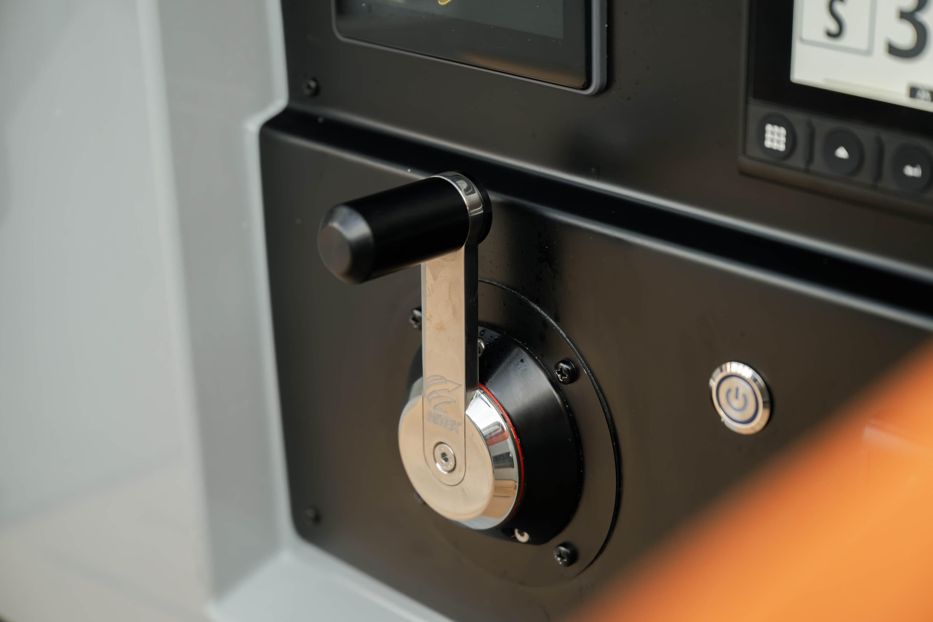 Control panel of 2026 Saffier SE 28 Leopard yacht with lever and power button.