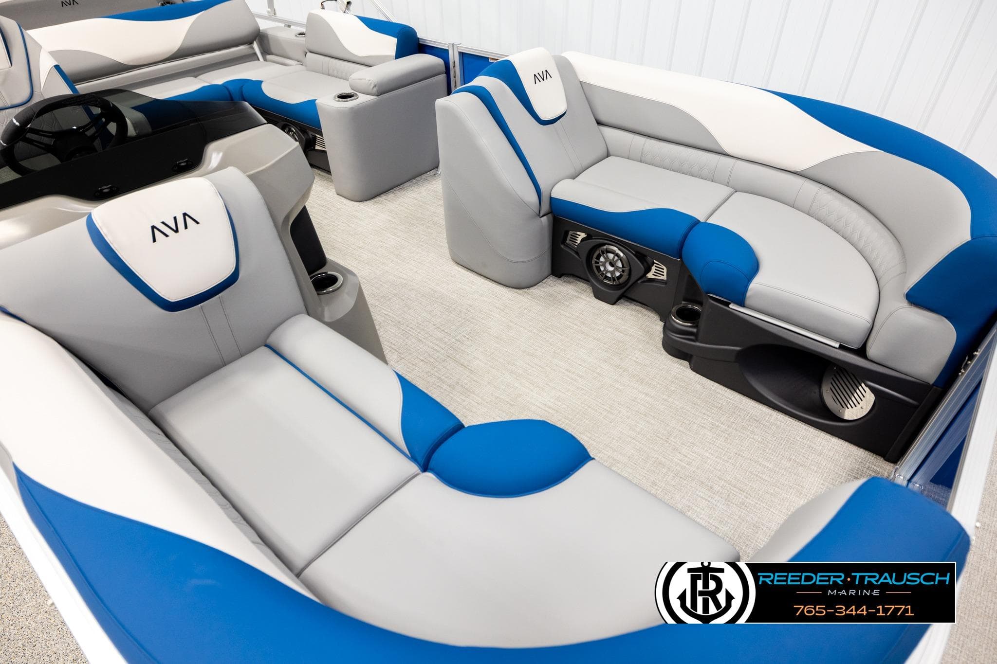 Luxurious 2026 Avalon LSZ Vrl boat interior with blue and gray seating.