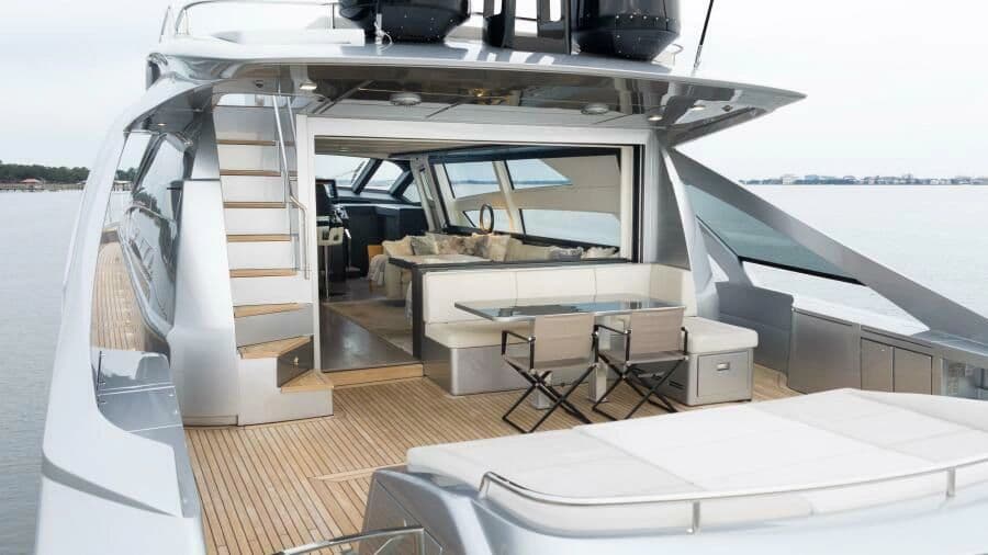 Luxury Pershing 9X 2022 yacht with modern design and spacious deck.