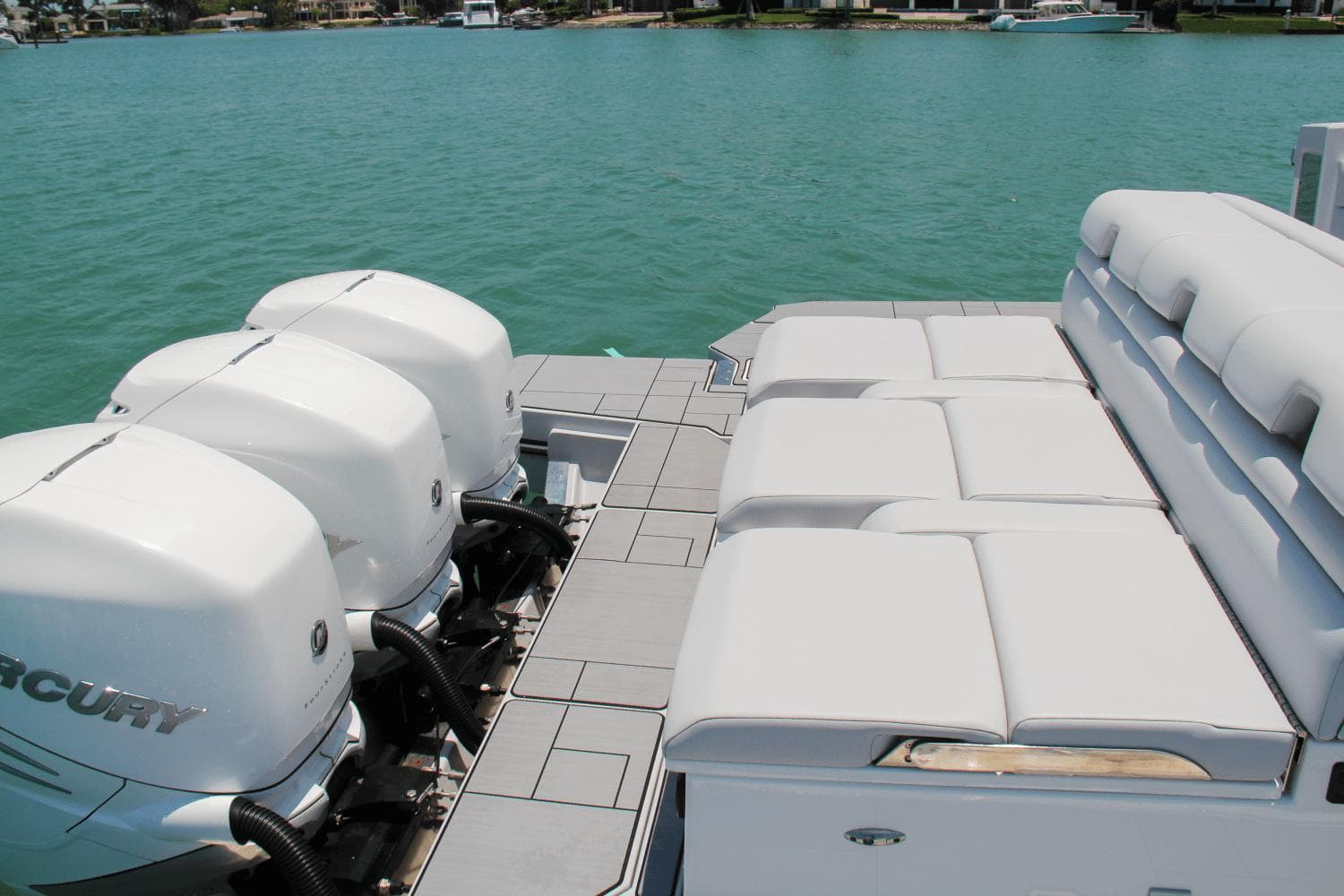 2023 Aviara AV40 OB boat with triple Mercury outboard engines and spacious seating.