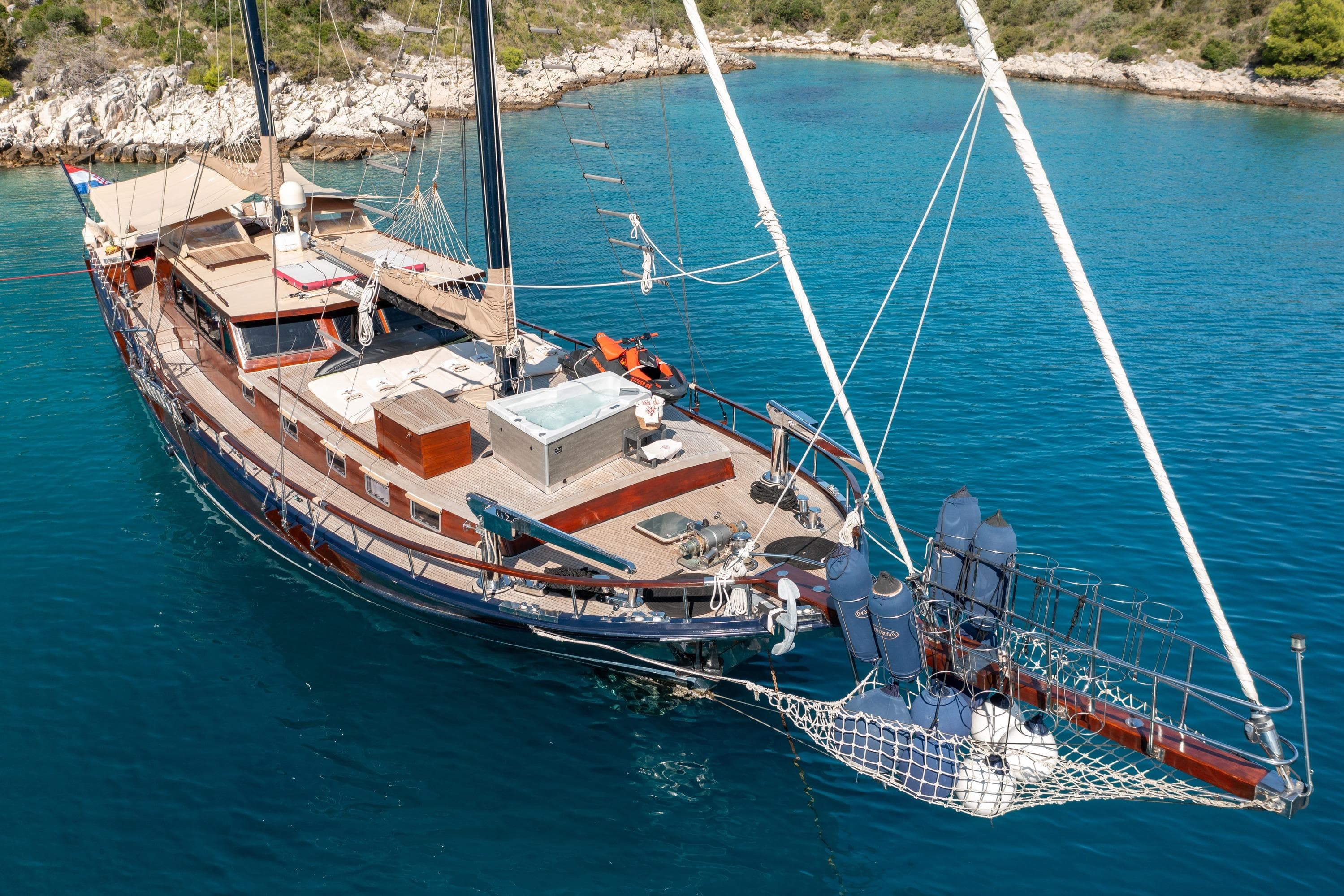 Luxurious 2000 Custom GULET yacht anchored in serene turquoise waters.