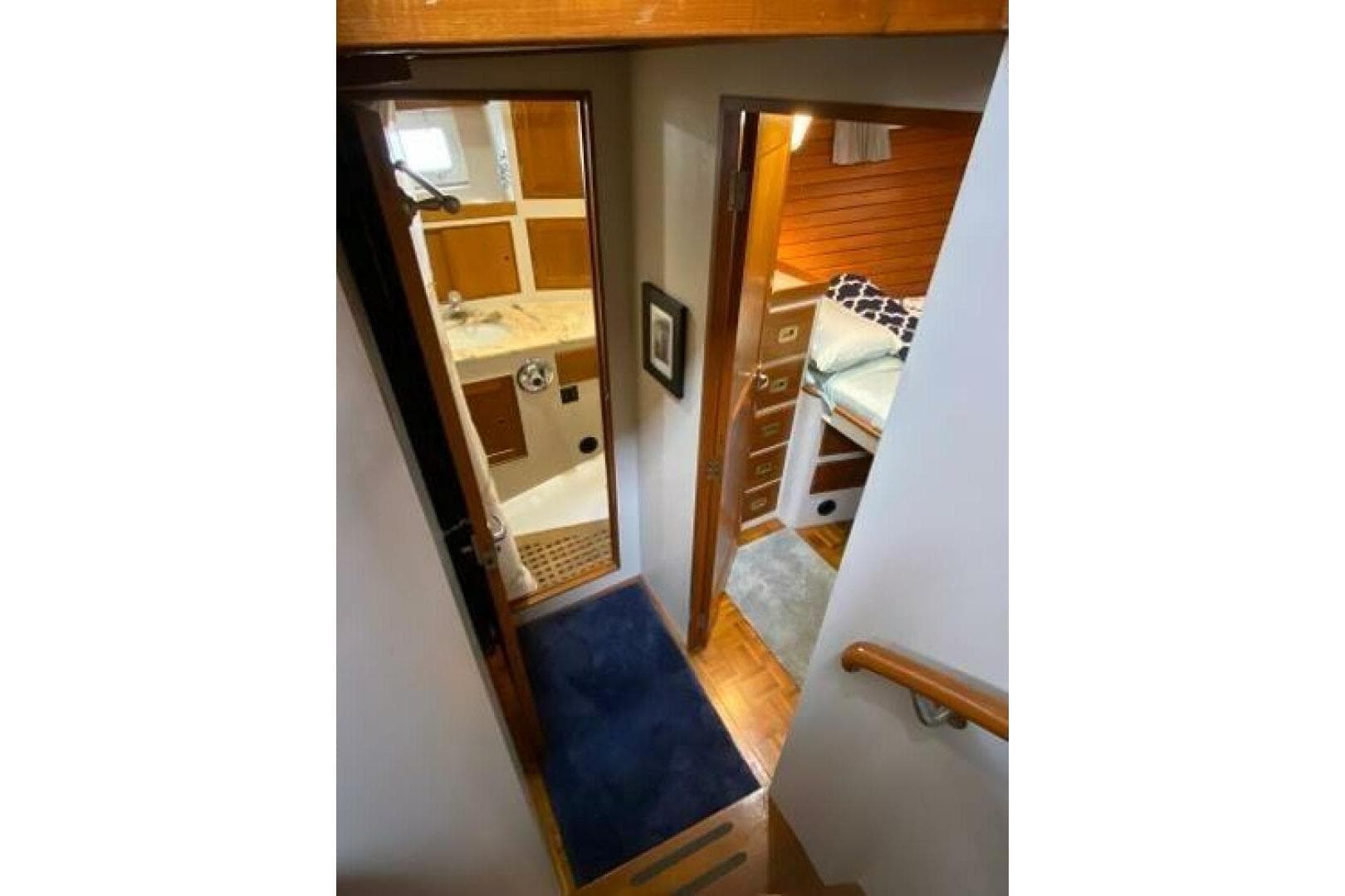 Interior view of 1973 Grand Banks 49 Alaskan yacht, featuring a cozy cabin and bathroom.
