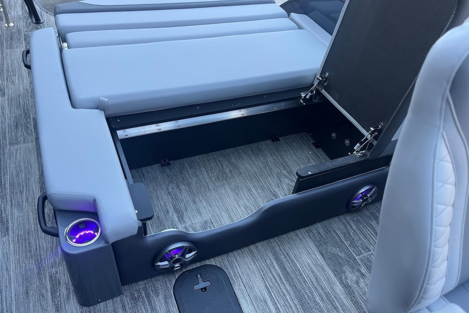 2026 Godfrey Monaco 235 SFL boat interior with adjustable seating and integrated cup holders.