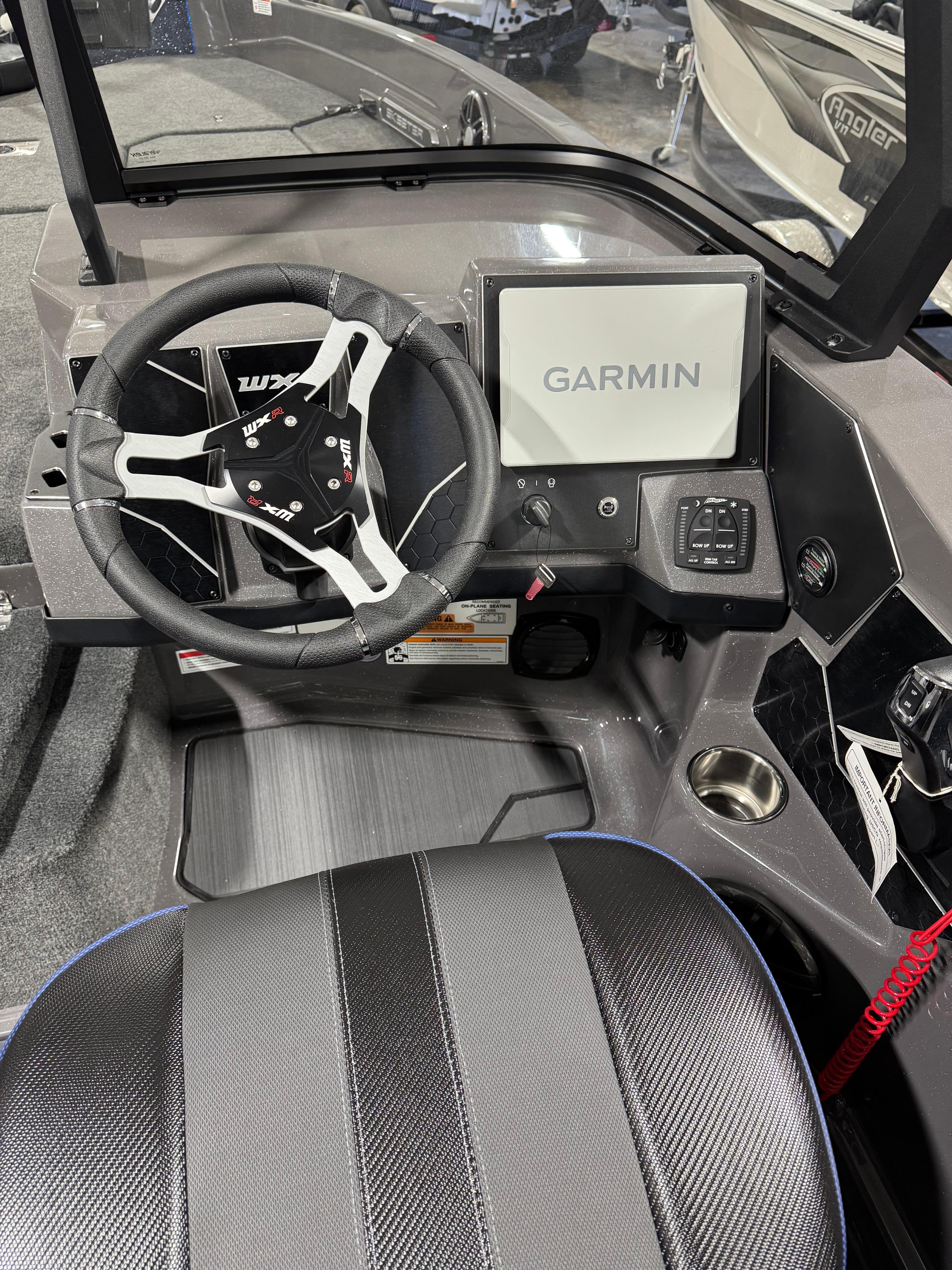 2025 Skeeter WXR 2260 F boat cockpit with Garmin navigation system.