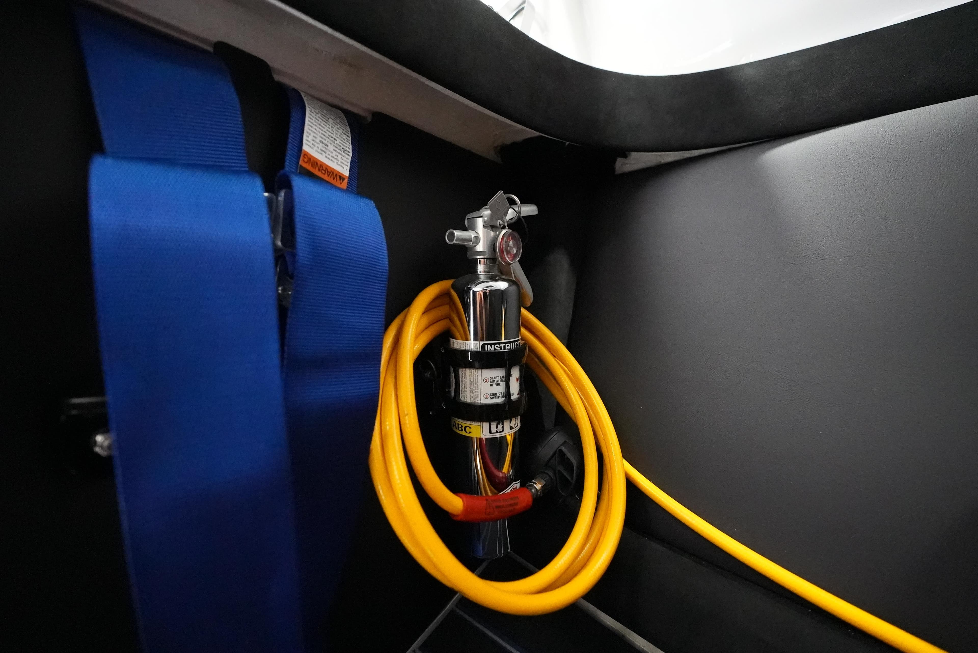 Safety equipment and wiring inside a 2007 Mystic Powerboats 50' model.