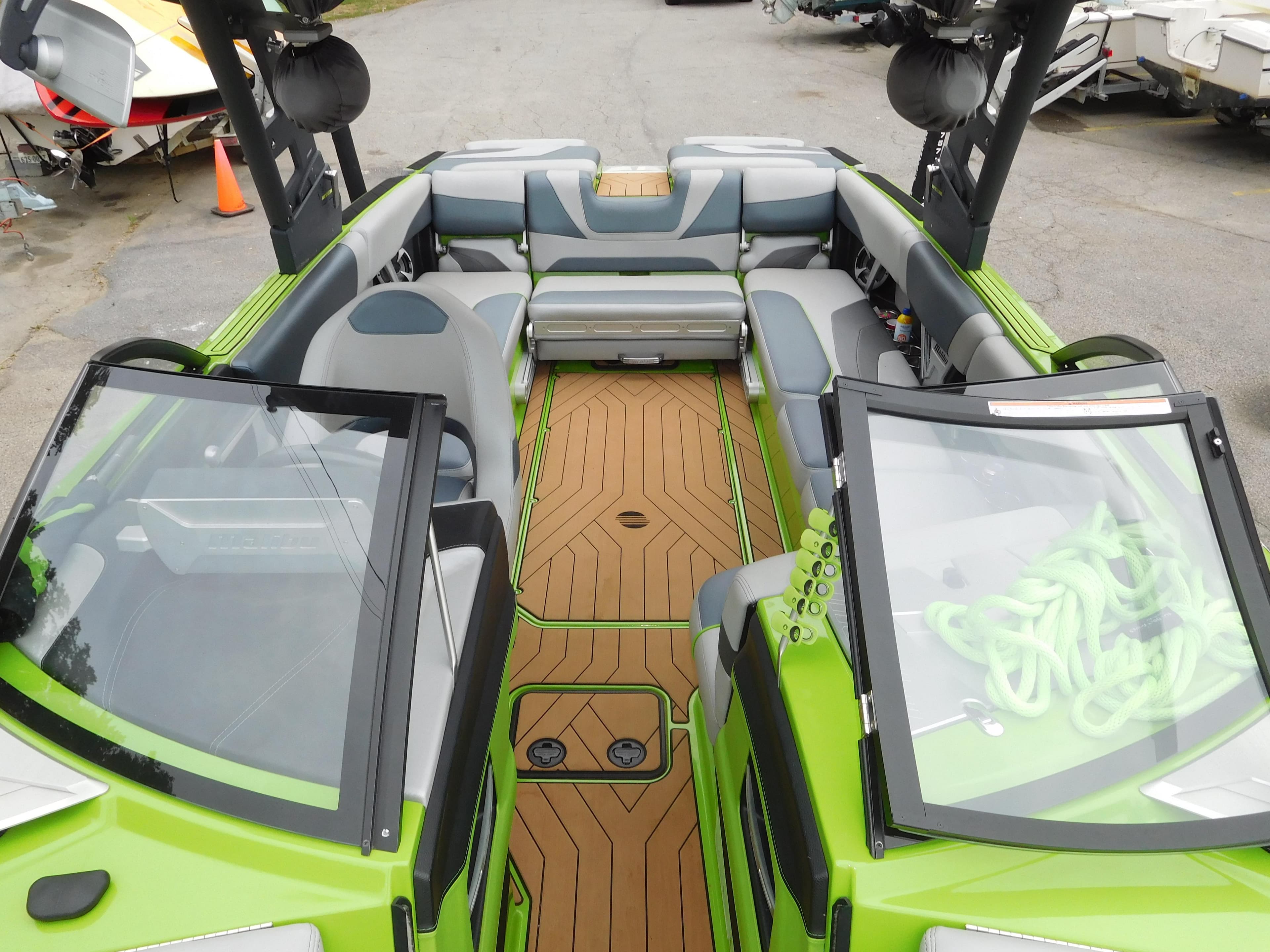 2017 Malibu Wakesetter 24 MXZ interior with green accents and spacious seating.