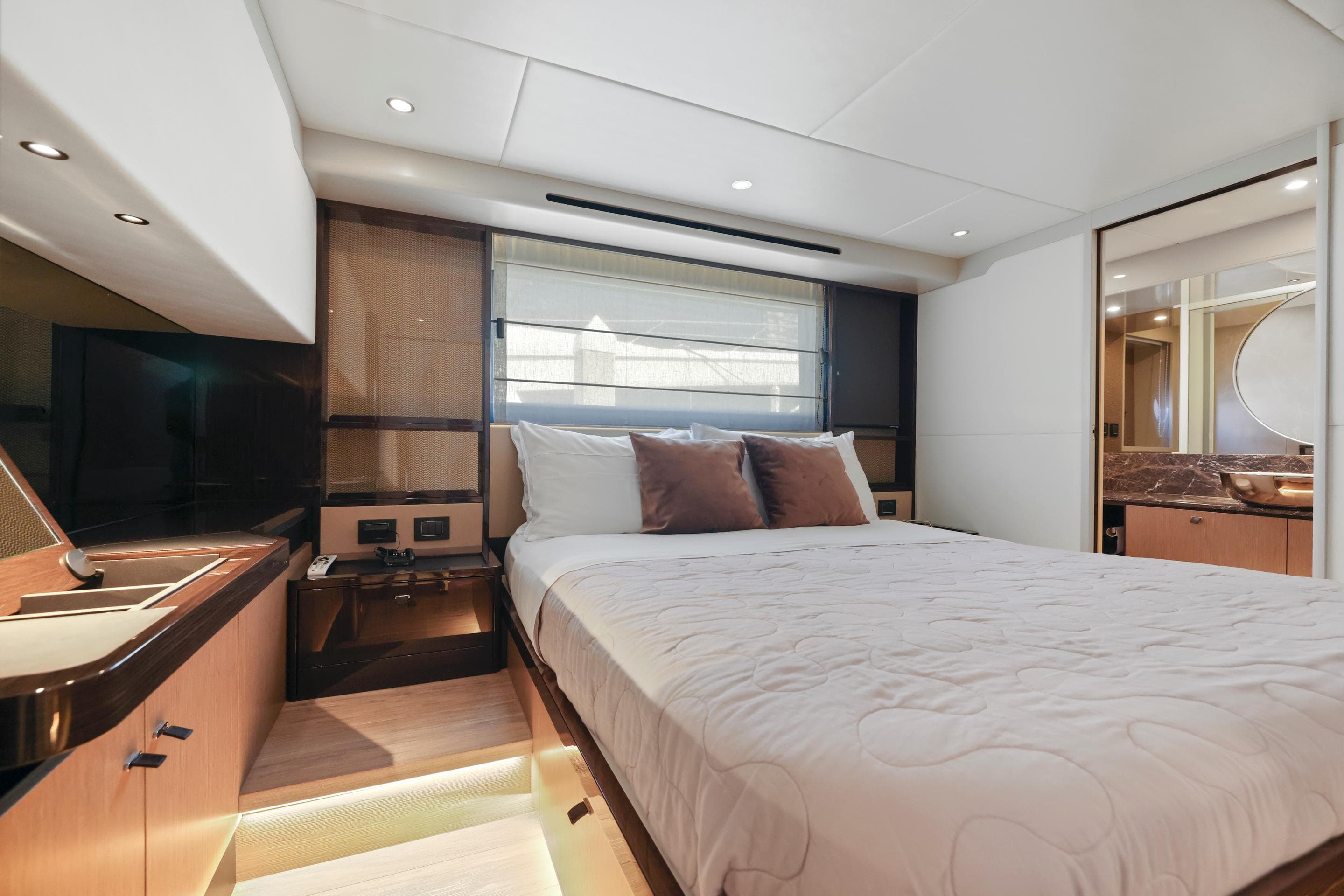 Luxurious bedroom interior of the 2024 Absolute 60 Fly yacht.