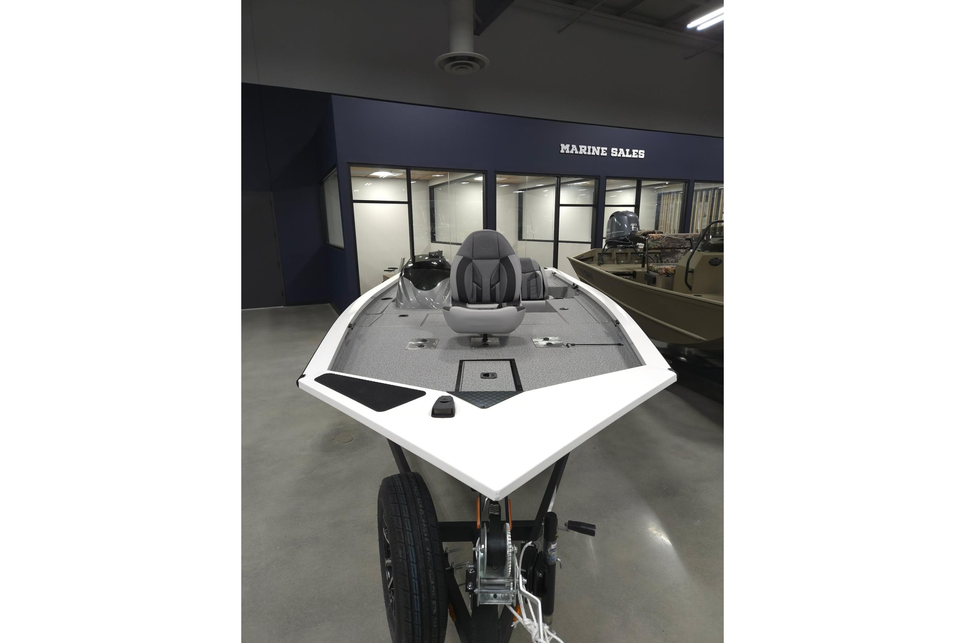 2026 G3 Sportsman 1810 PFX boat displayed in a marine sales showroom.