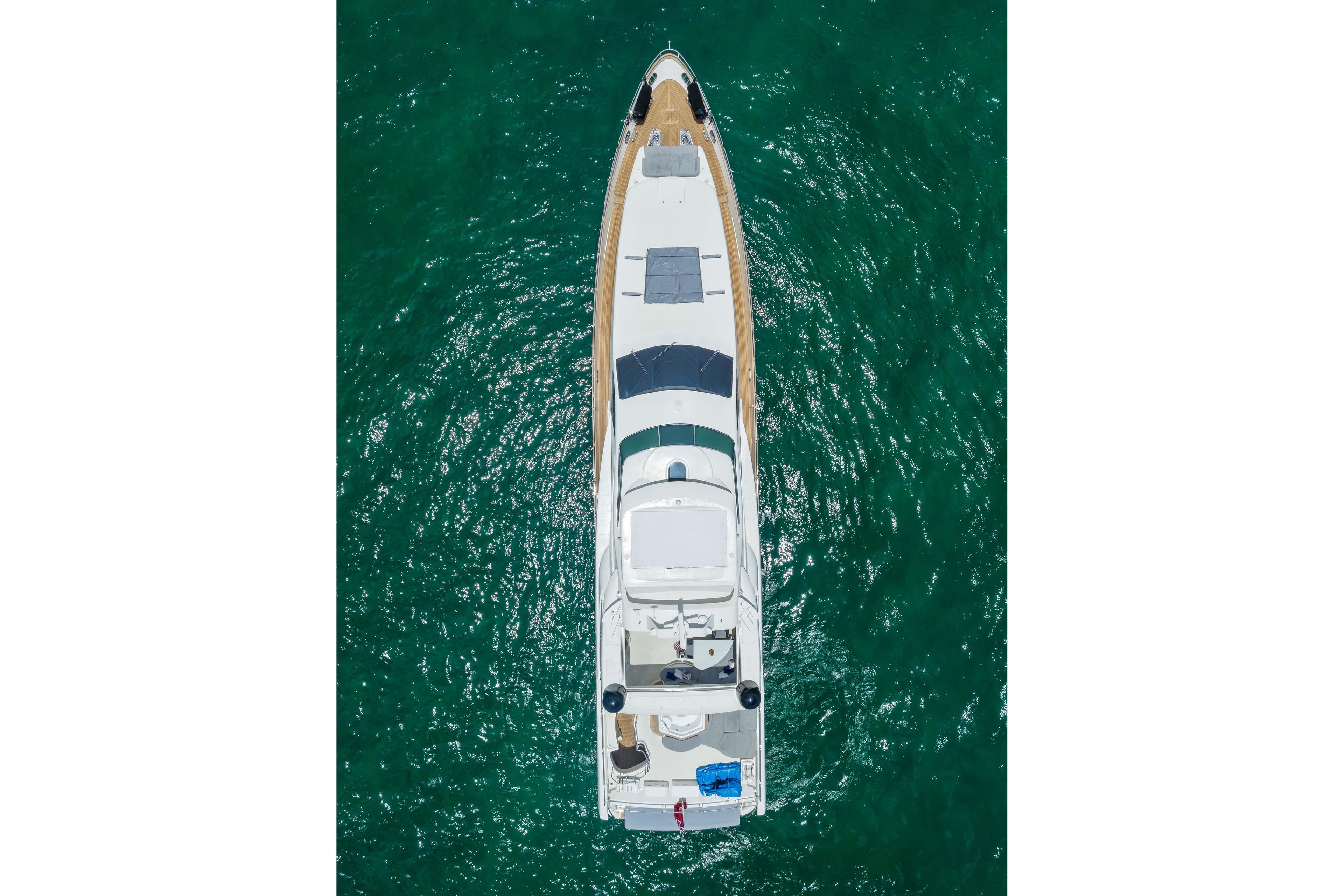 Aerial view of 2012 Azimut yacht on clear turquoise water.