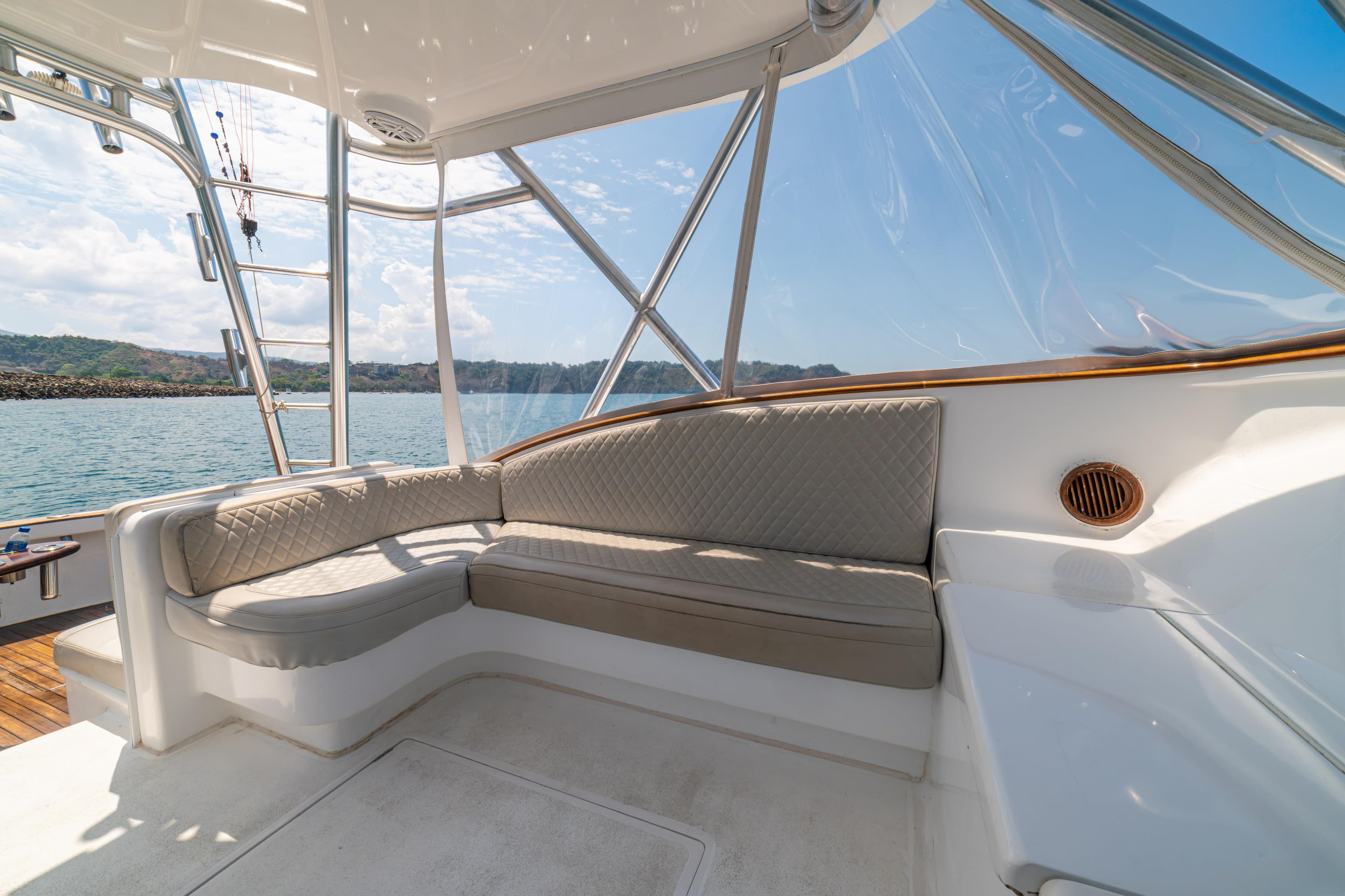 Luxurious seating area on 2018 Maverick Yachts Costa Rica 36 Walkaround, overlooking serene waters.
