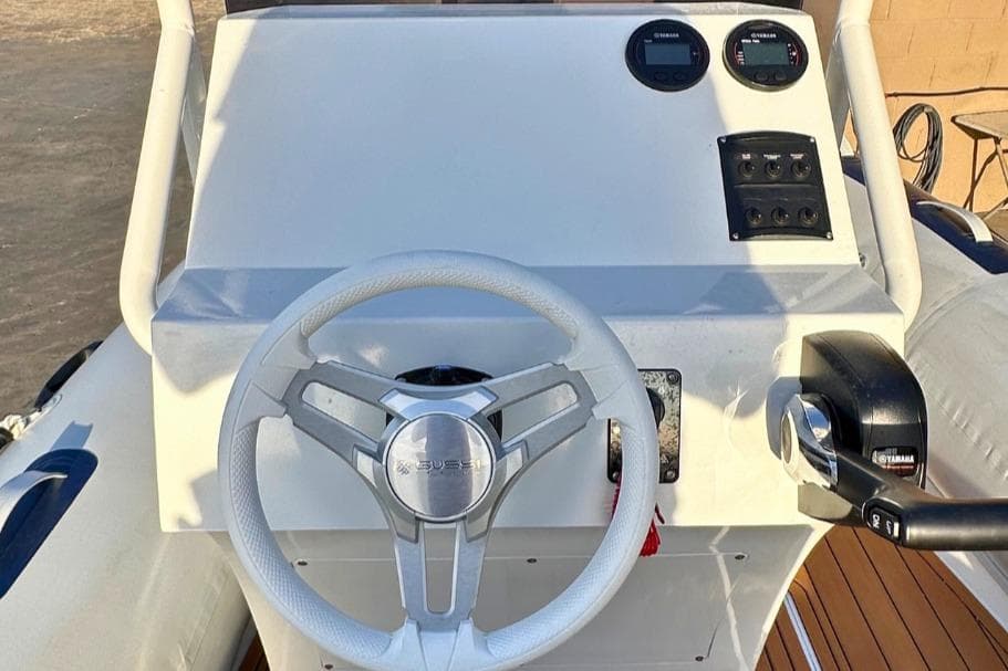 Steering console of 2026 Maro Boats M561 with Yamaha controls and gauges.