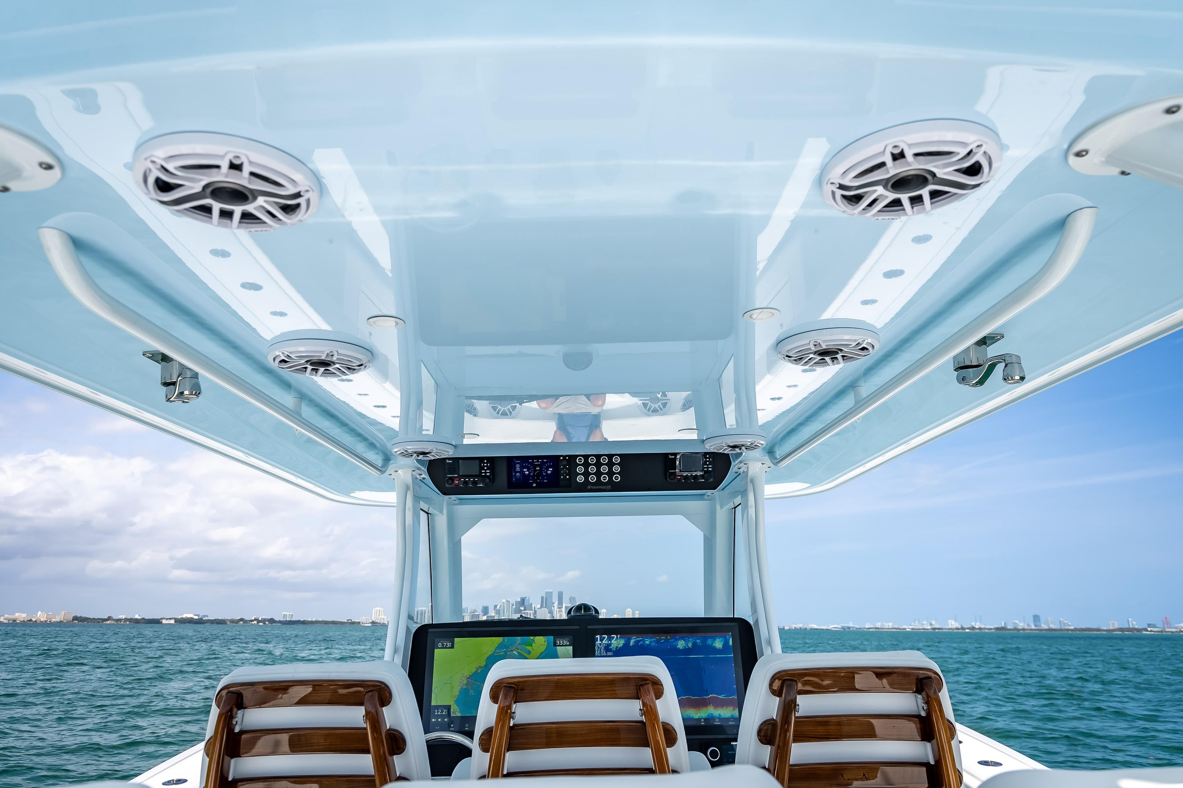 2025 Freeman 43 boat interior with advanced navigation system and ocean view.
