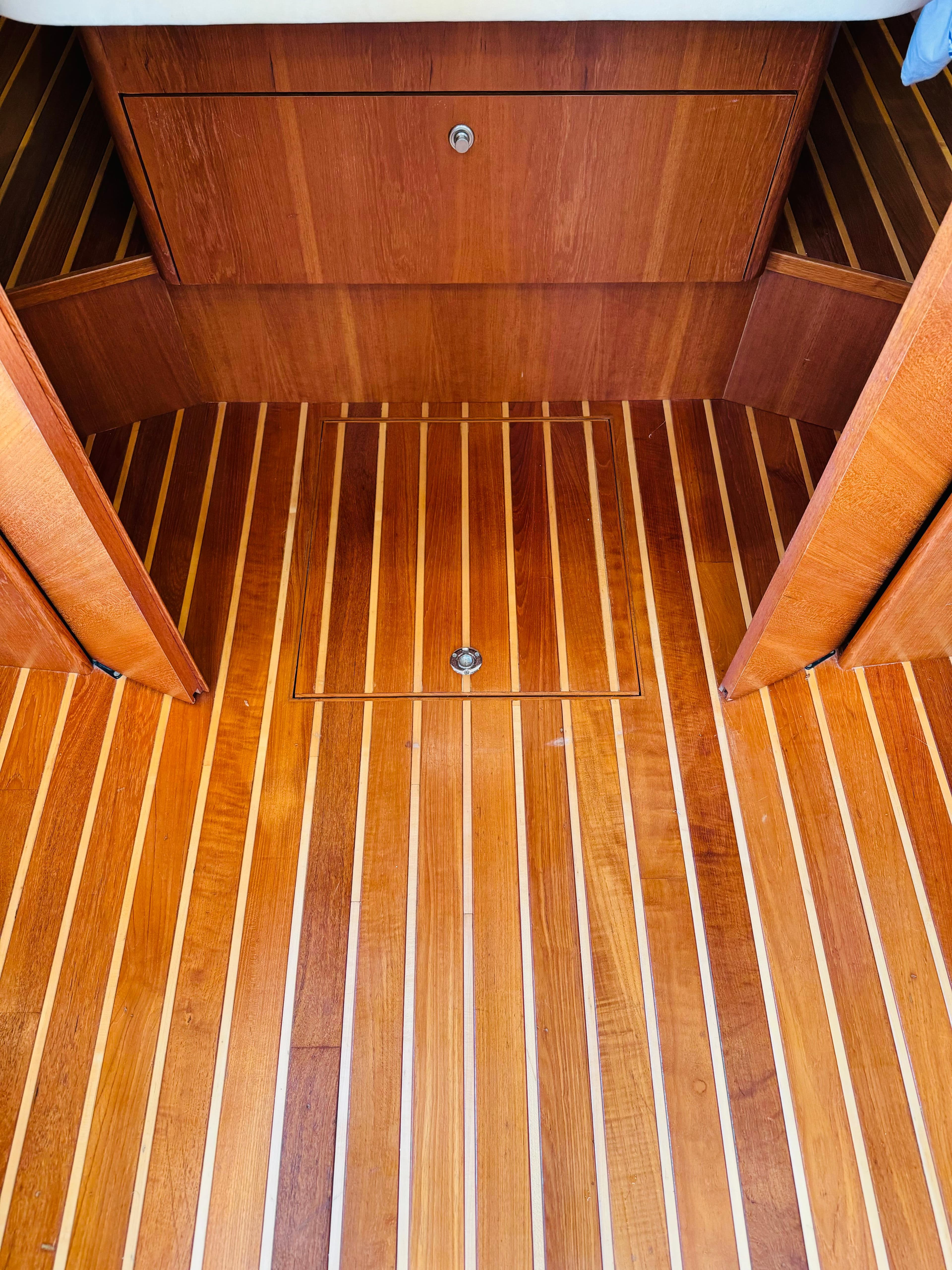 2007 Tiara Yachts 3900 Sovran interior with polished wooden flooring.